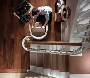 professional-technician-installing-curved-stair-lift_opt.jpg