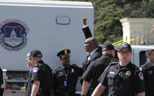 Sierra Club President Aaron Muir getting arrested in Washington, D.C. last April.