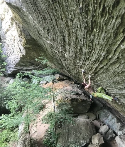 Dru Mack climbing Zookeeper (14a) in the Red River Gorge