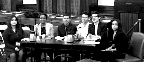 Students testify before the Department of Education