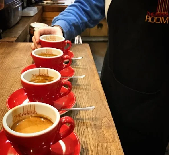 Press-Room-Coffee-Shop-cups-in-a-row.jpg