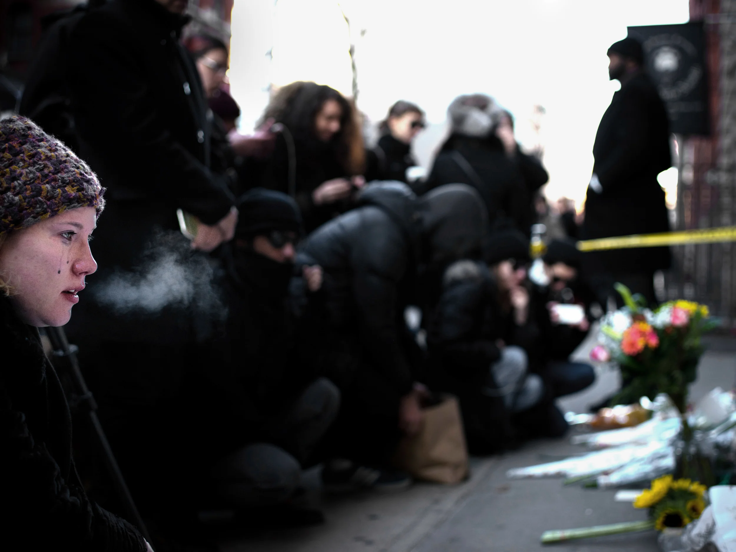 Cassandra Lee Jones, a die hard Bowie fan, cried at a makeshift memorial after placing flowers for the dead star.