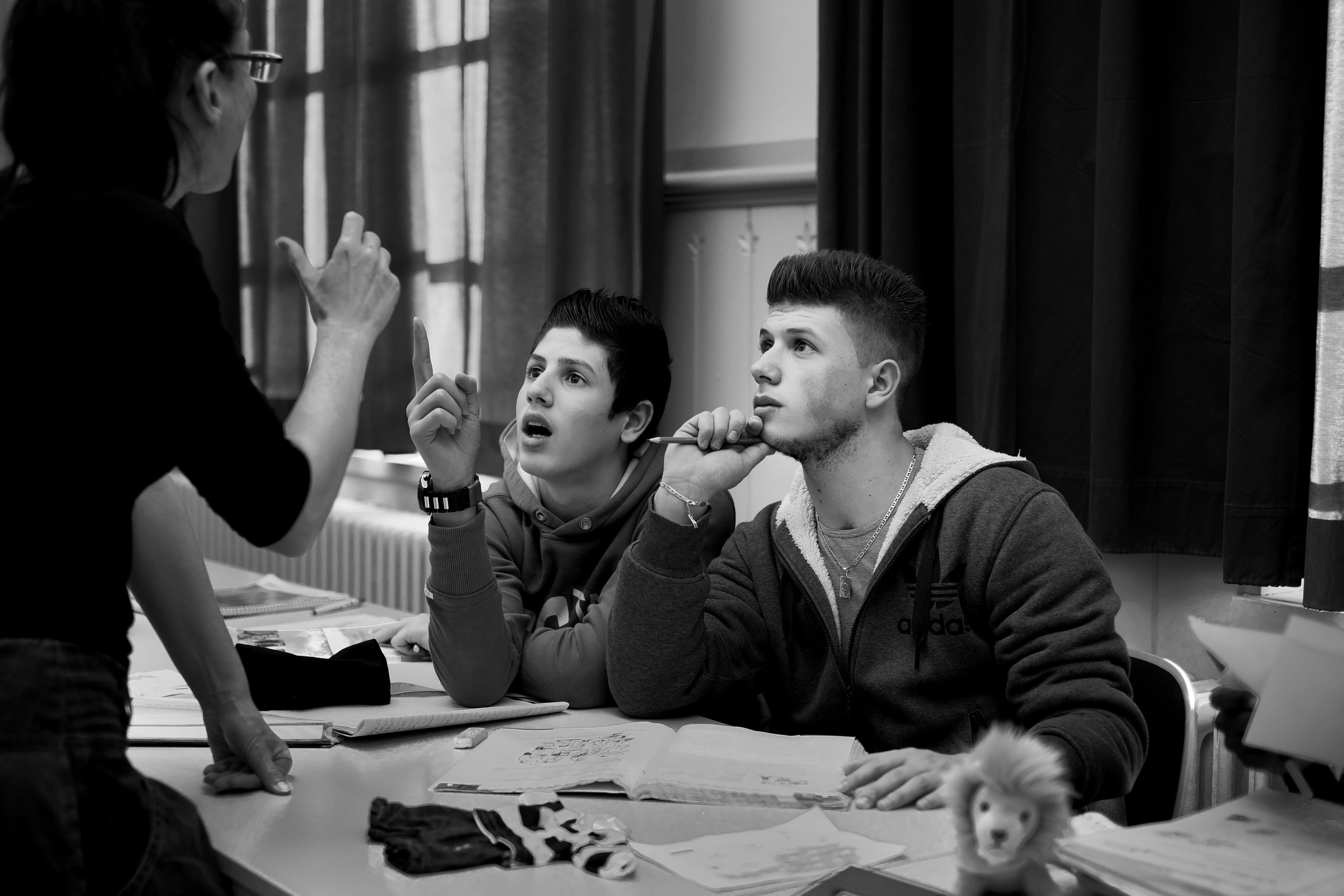  Ali and Ahmad, from Lebanon, learn German in a language class for refugee children. 