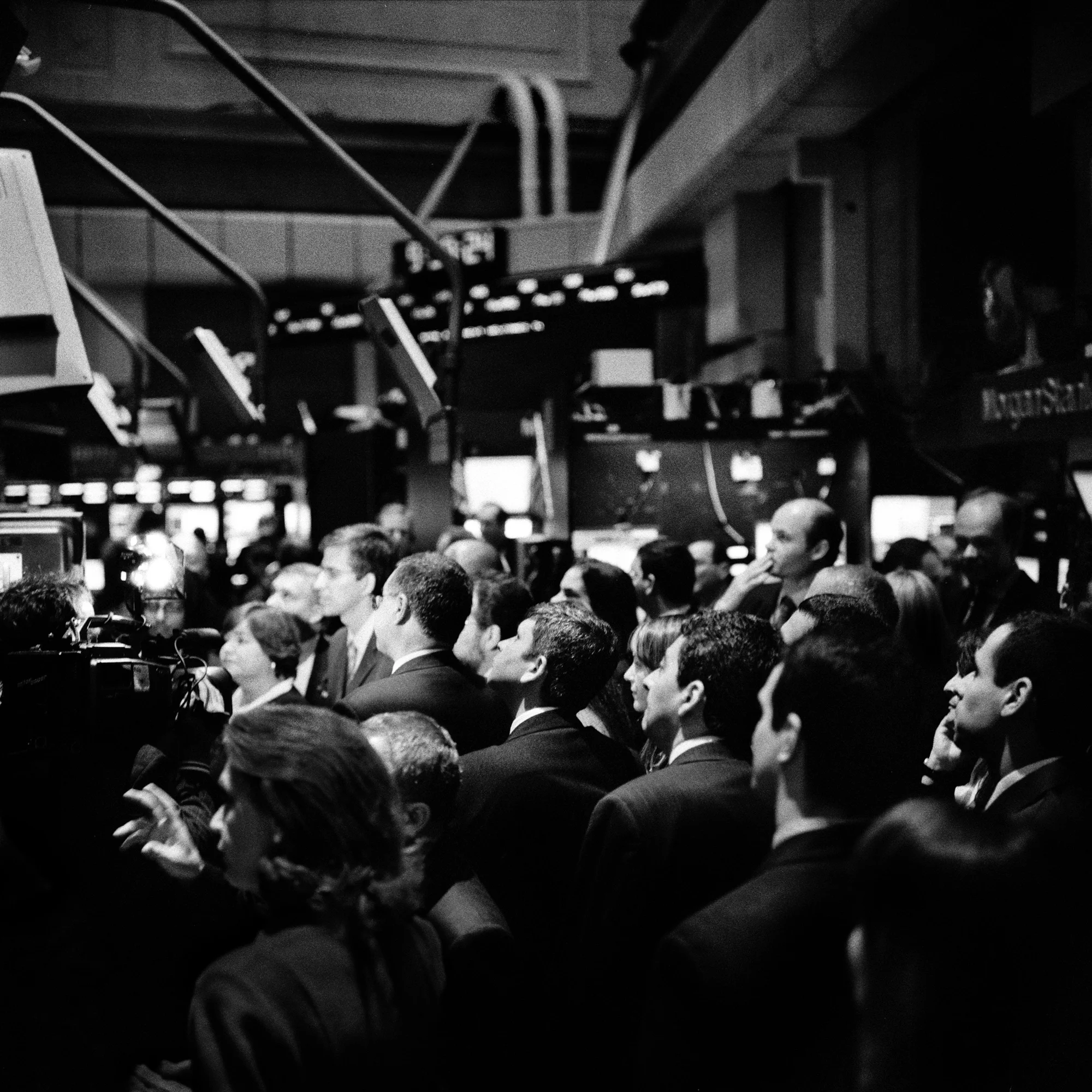   Bankers monitor the Morgan Stanley consuls on the floor of the New York Stock Exchange.  