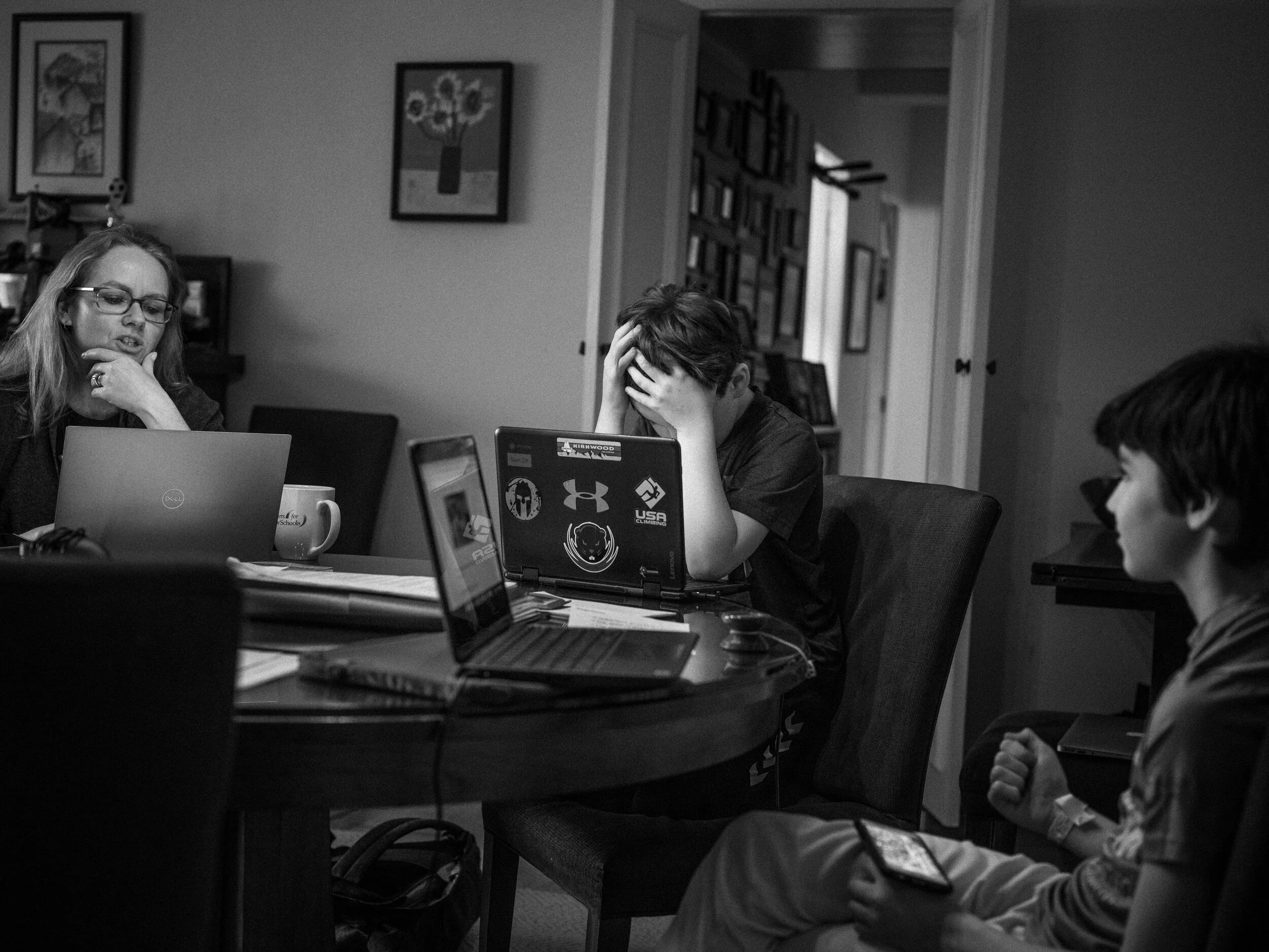  Sam, a 5th Grader, studied at home after schools throughout New York were closed. His mother read him an email that said basketball had been cancelled. 