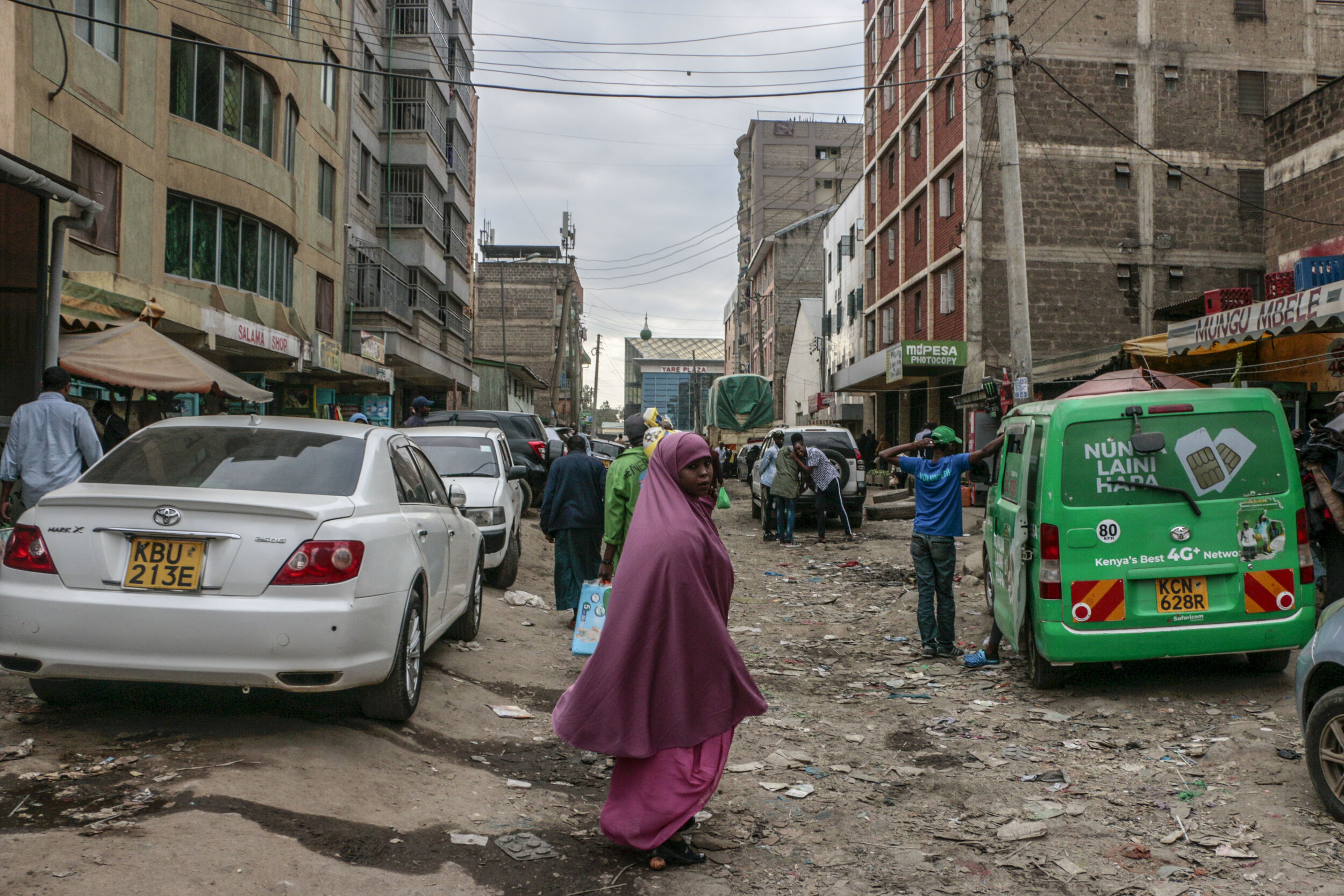  Hamdi Kosar pauses while walking through the streets of Eastleigh, a predominantly Muslim and Somali neighborhood in Nairobi, Aug. 16, 2019. Many Somali refugees shop here while they are in the resettlement centers before they head elsewhere to seek
