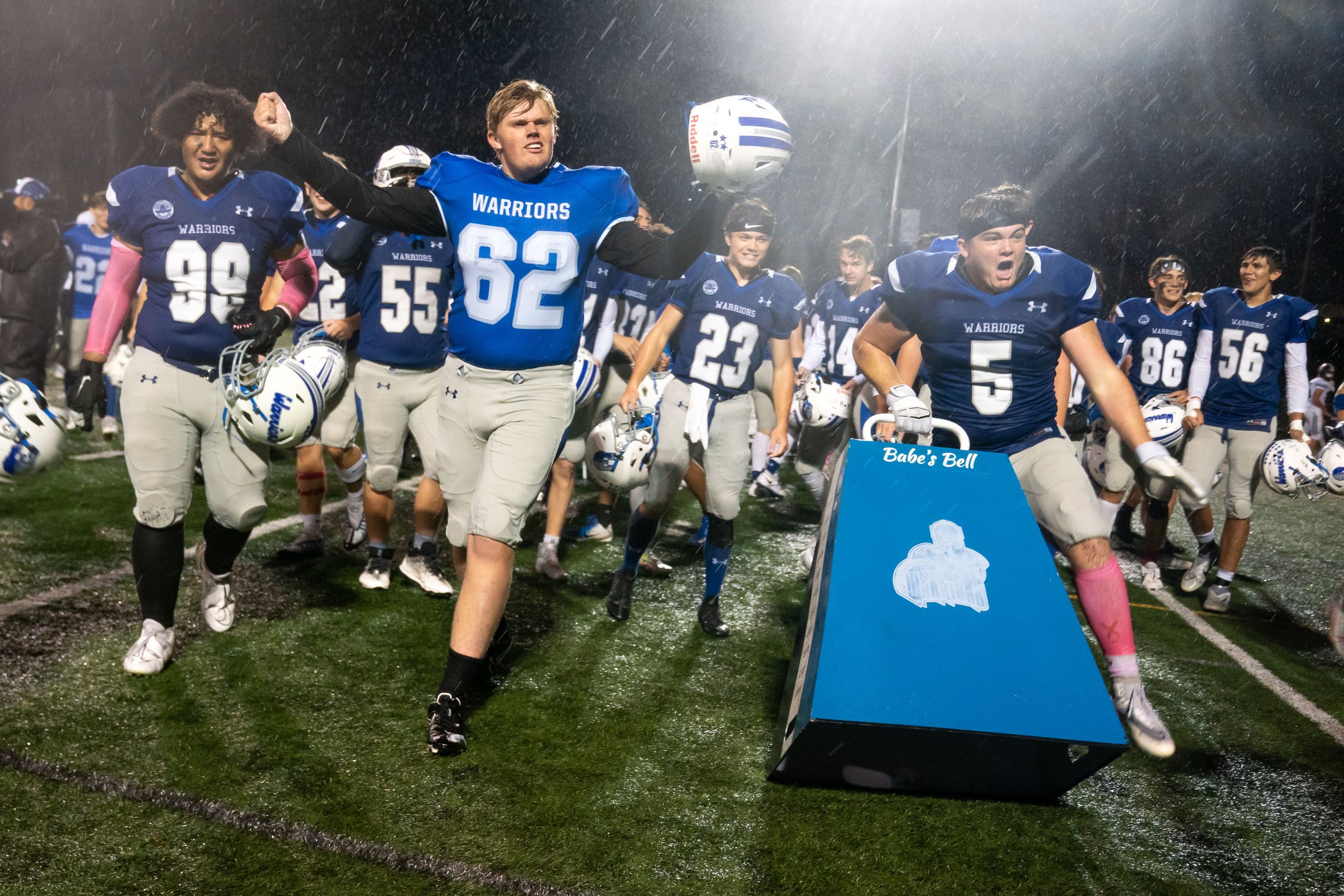  The Brainerd High School football team celebrates after winning their homecoming game against Bemidji Sept. 23, 2022 in Brainerd, Minn. Brainerd and Bemidji compete every year to win “Babe’s Bell,” a traveling trophy. This is the first time Brainerd