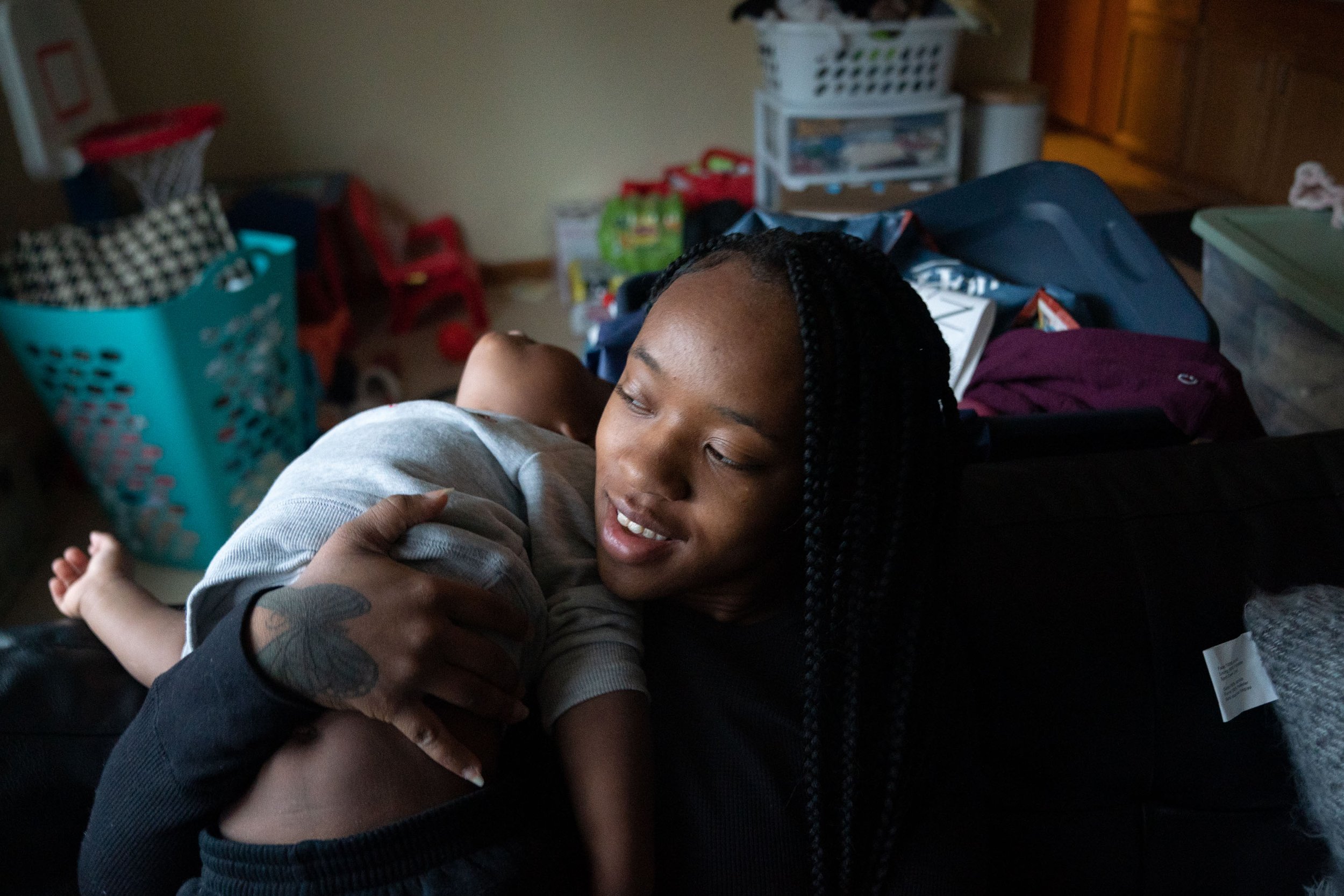  Tyzhane Carthron, 18, shares a moment with her son Geryiell Walker, 2, in her new apartment Nov. 11, 2022 in St. Paul. Carthron had moved into her apartment several days prior and is in the process of unpacking. This is her first time living alone. 