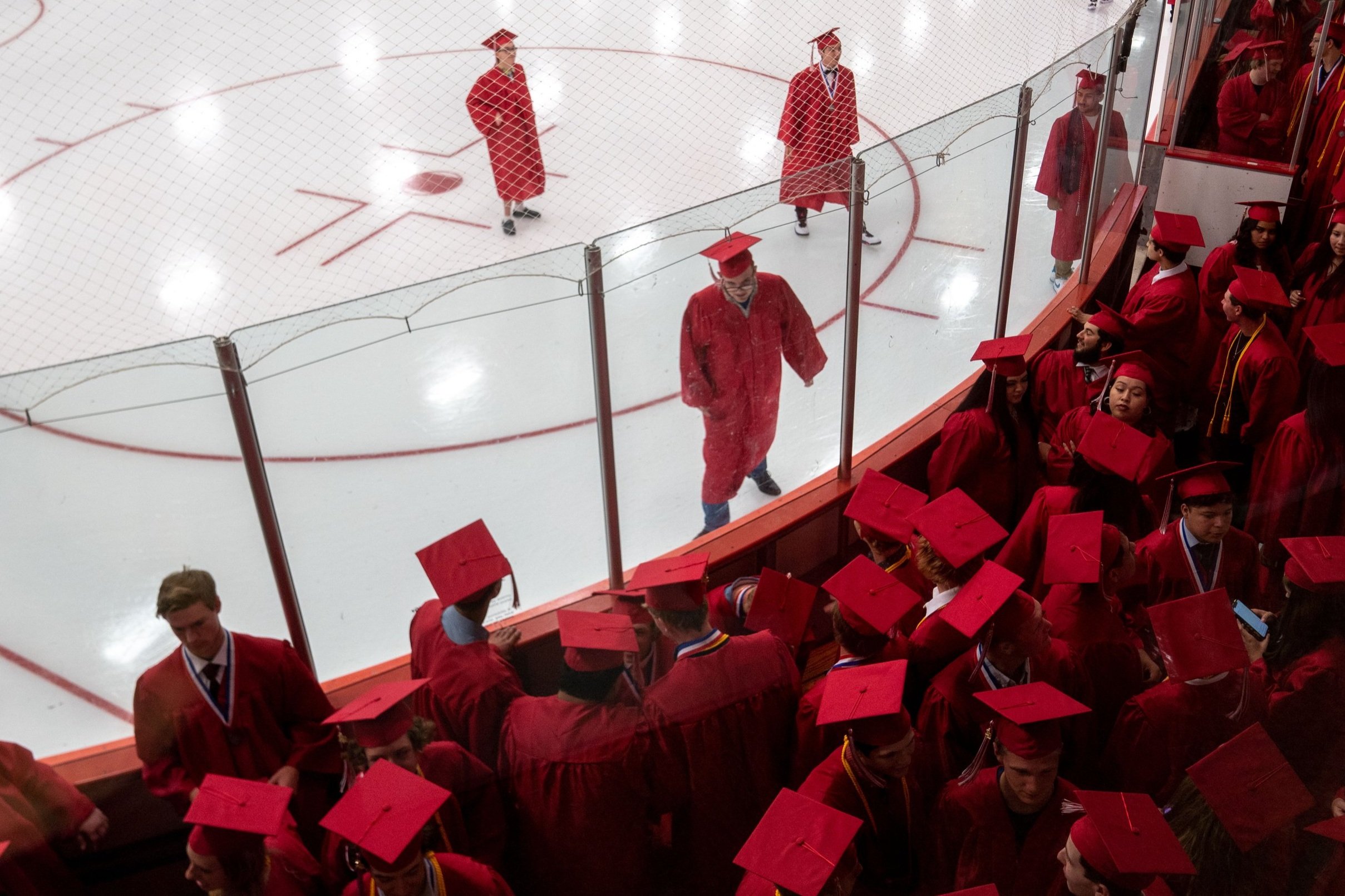  Willmar Senior High School students walk on ice before entering their commencement ceremony Sunday, June 5, 2022 at the Willmar Civic Center Arena in Willmar, Minn.  