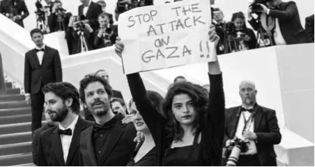 Lebanese actress Manal Issa protesting at the Cannes film festival