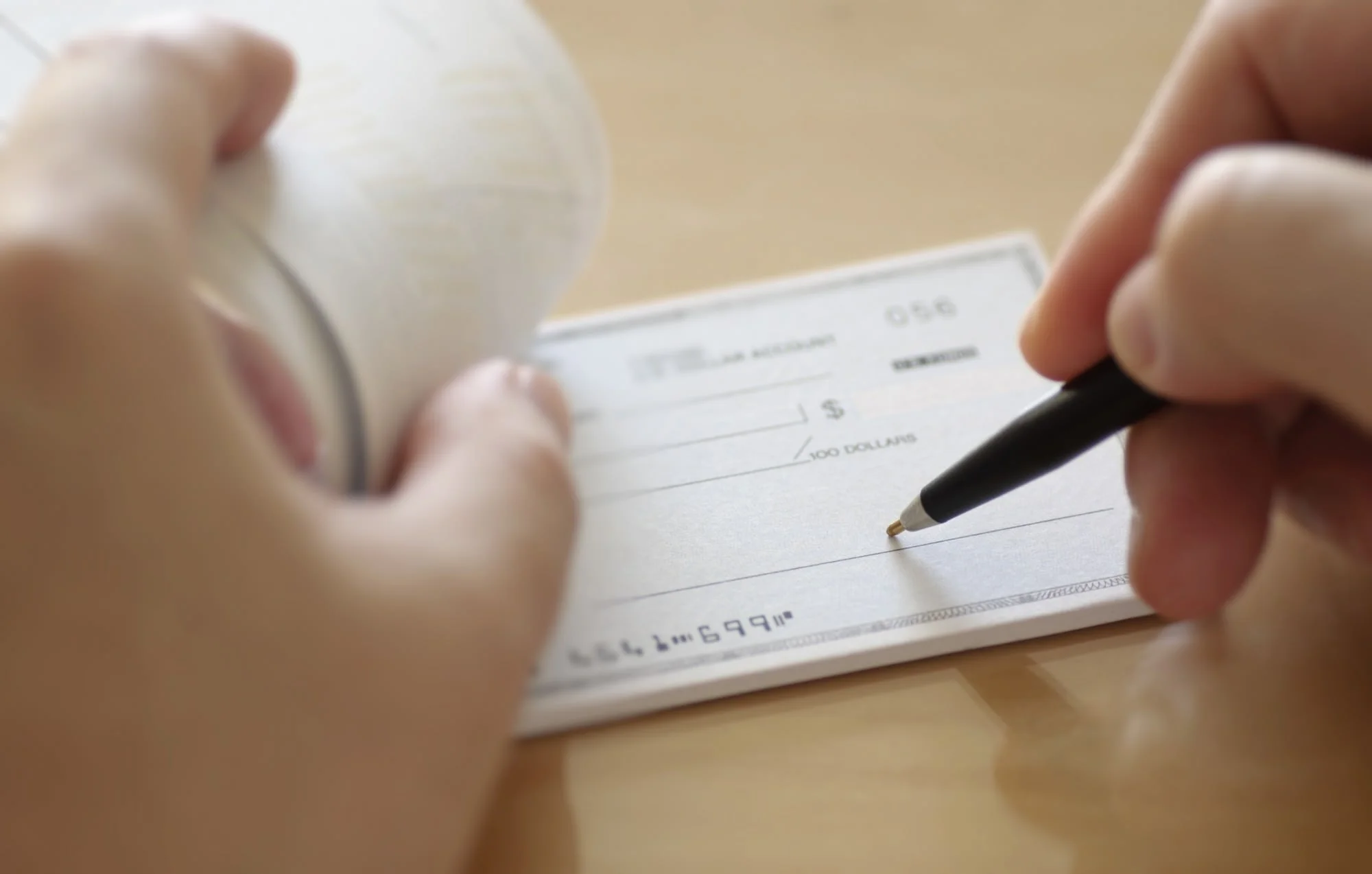 writting-check-payment-e1416365261981-1.jpg