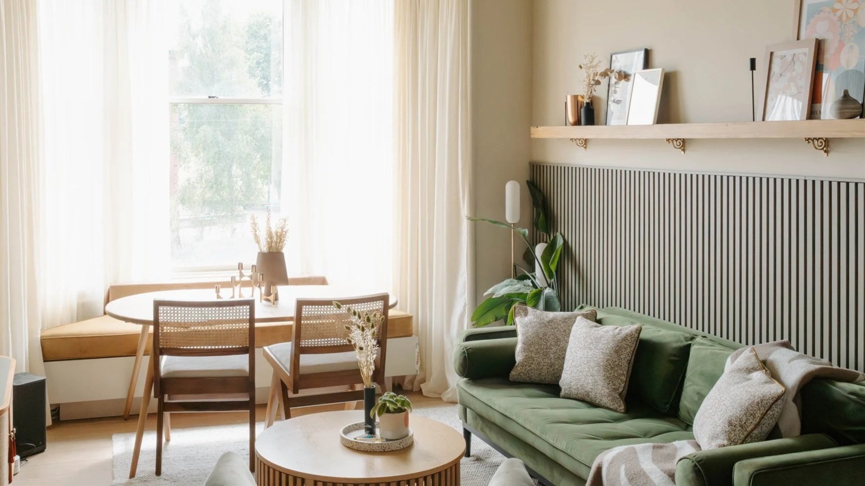 Scandinavian Modern green living room with dining area ©Detail Movement Interiors