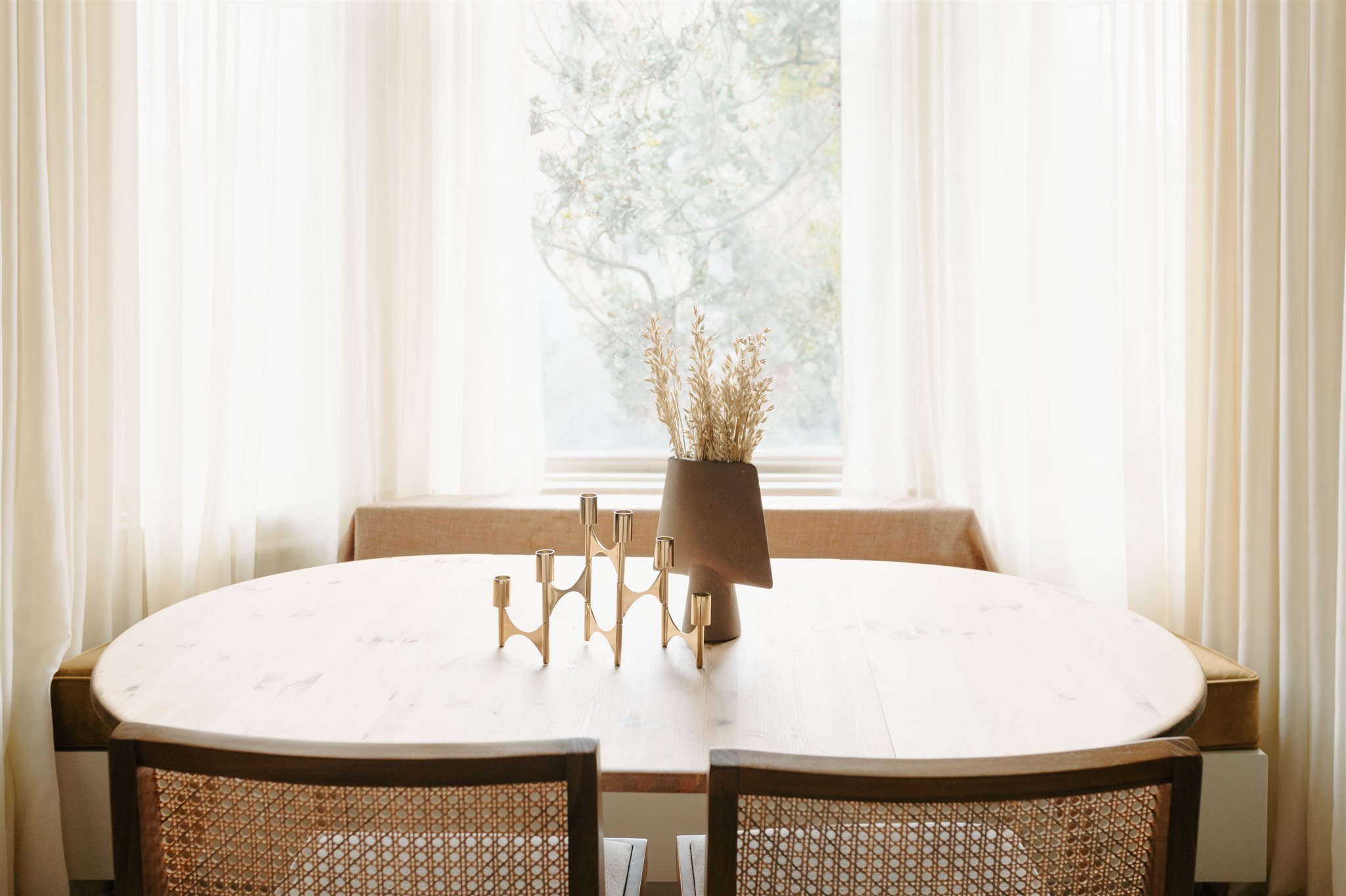 Scandi dining area in a living room window bay ©Detail Movement Interiors