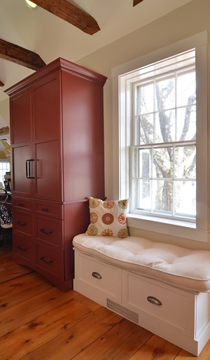 The barn-red pantry cabinet