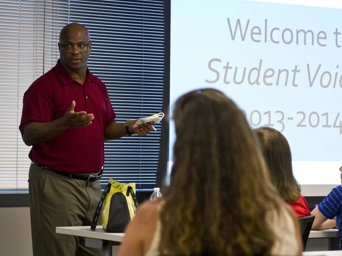 Hollis with writing students.jpg