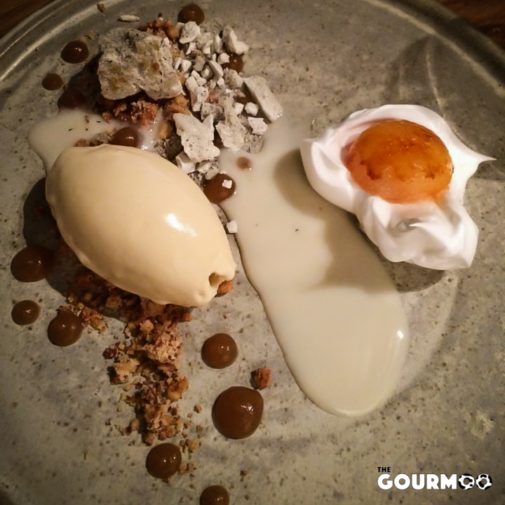 Brûlée egg yolk, goat's milk, burnt butter and hay.