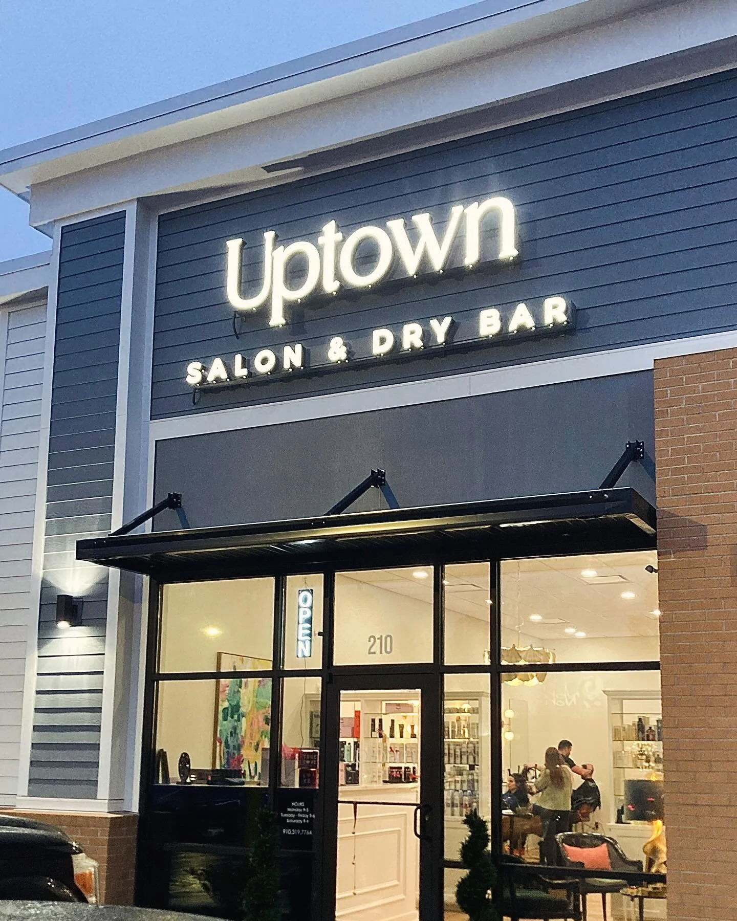 Good looking salon @uptownsalonanddrybar , good looking hair @huntermarcumhair and @ashleyhorrellhair , good looking sign @mindydesignssigns ! 

#travelingsigngirl #hair #salon #oribe #signs #signletters #signdesign #signswilmingtonnc #illuminatedsig