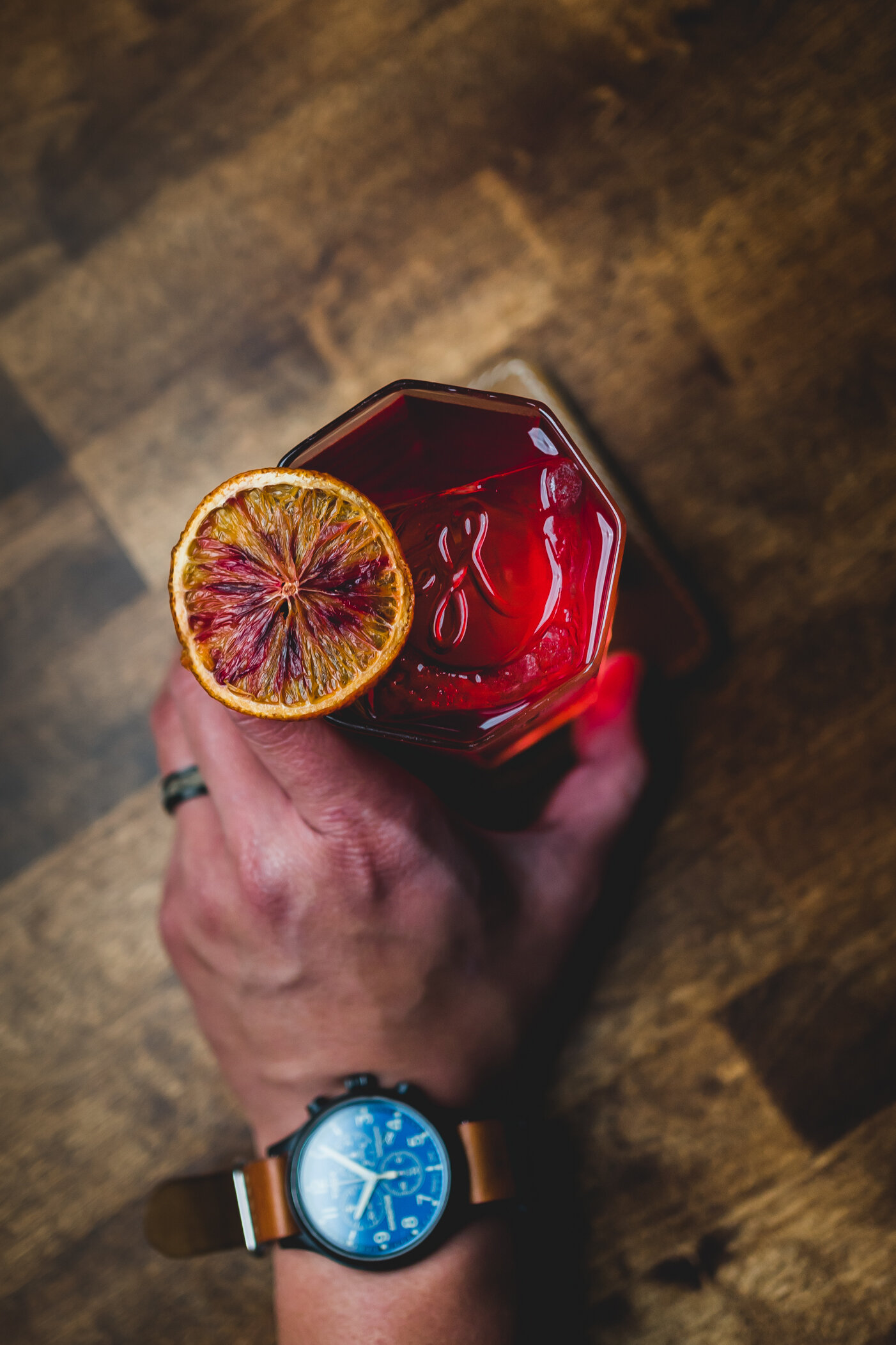 holy city handcraft cocktail orange garnish campari