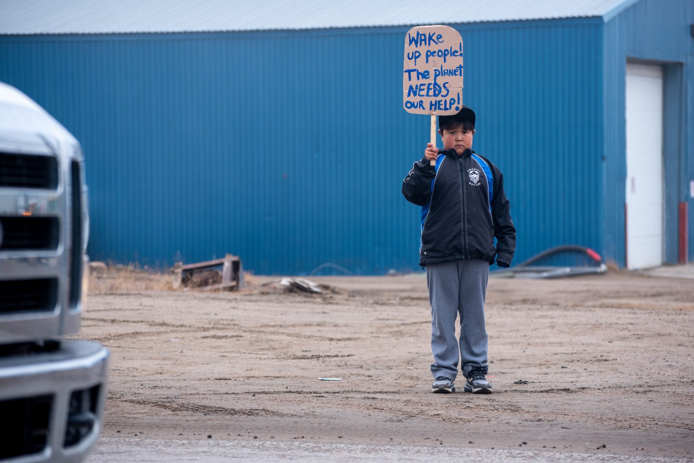 Iqaluit_Boy-with-Sign_September-Climate-Strike.jpg