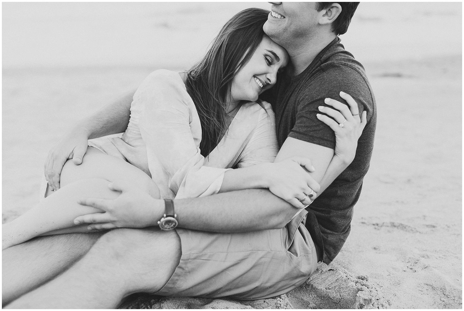 playful engagement session on beach