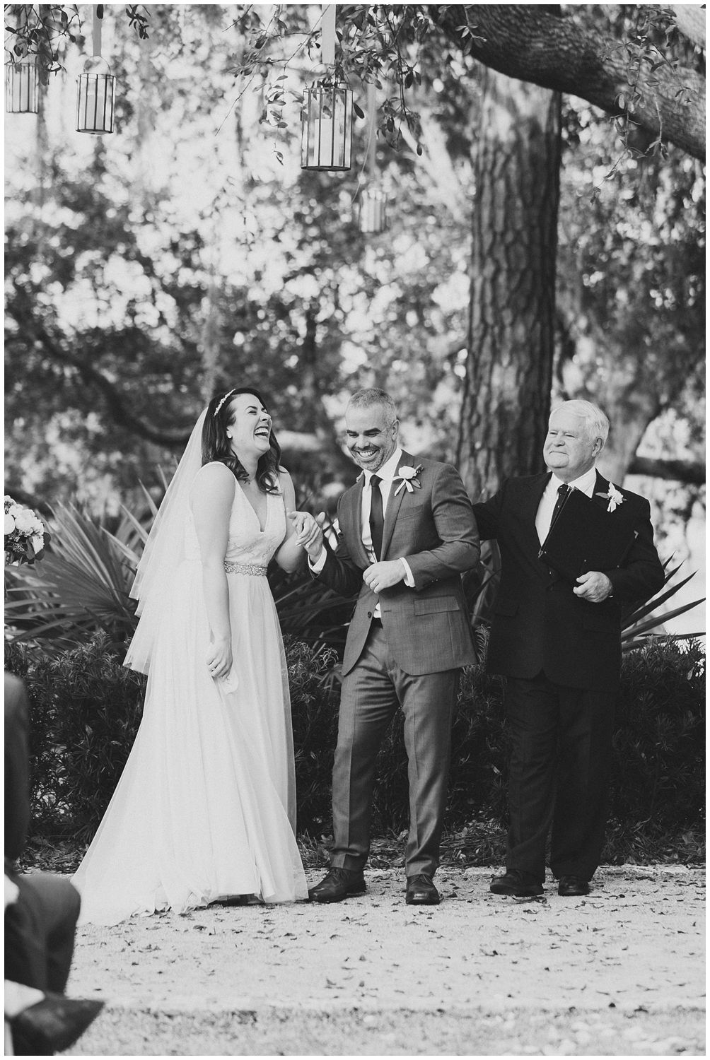 bride and groom laughing during ceremony