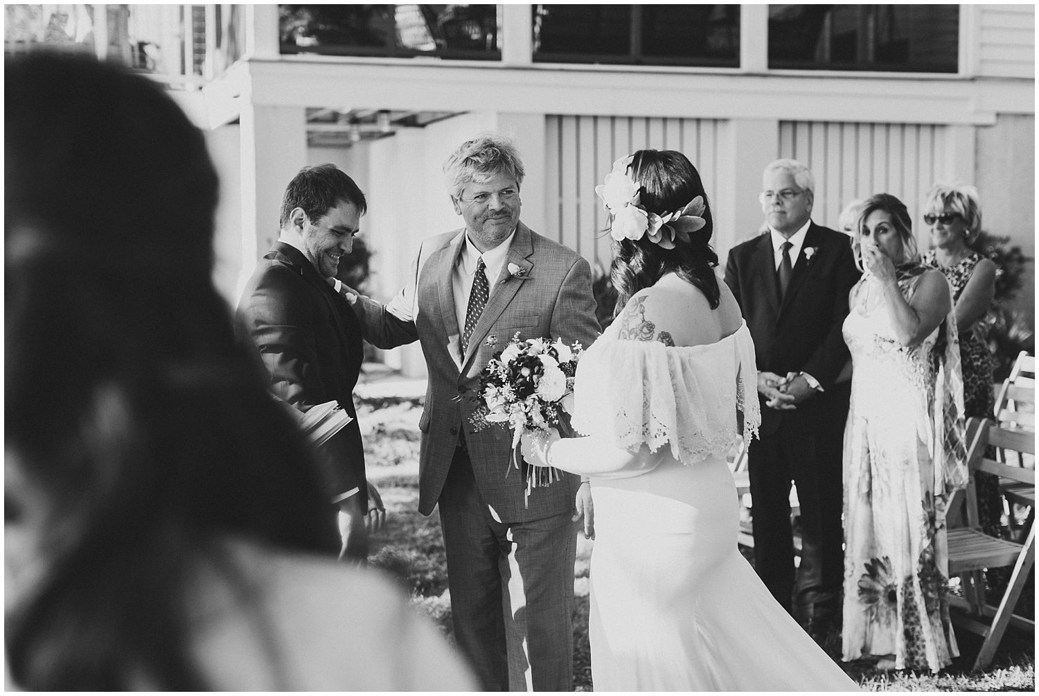 Father giving away bride at wedding