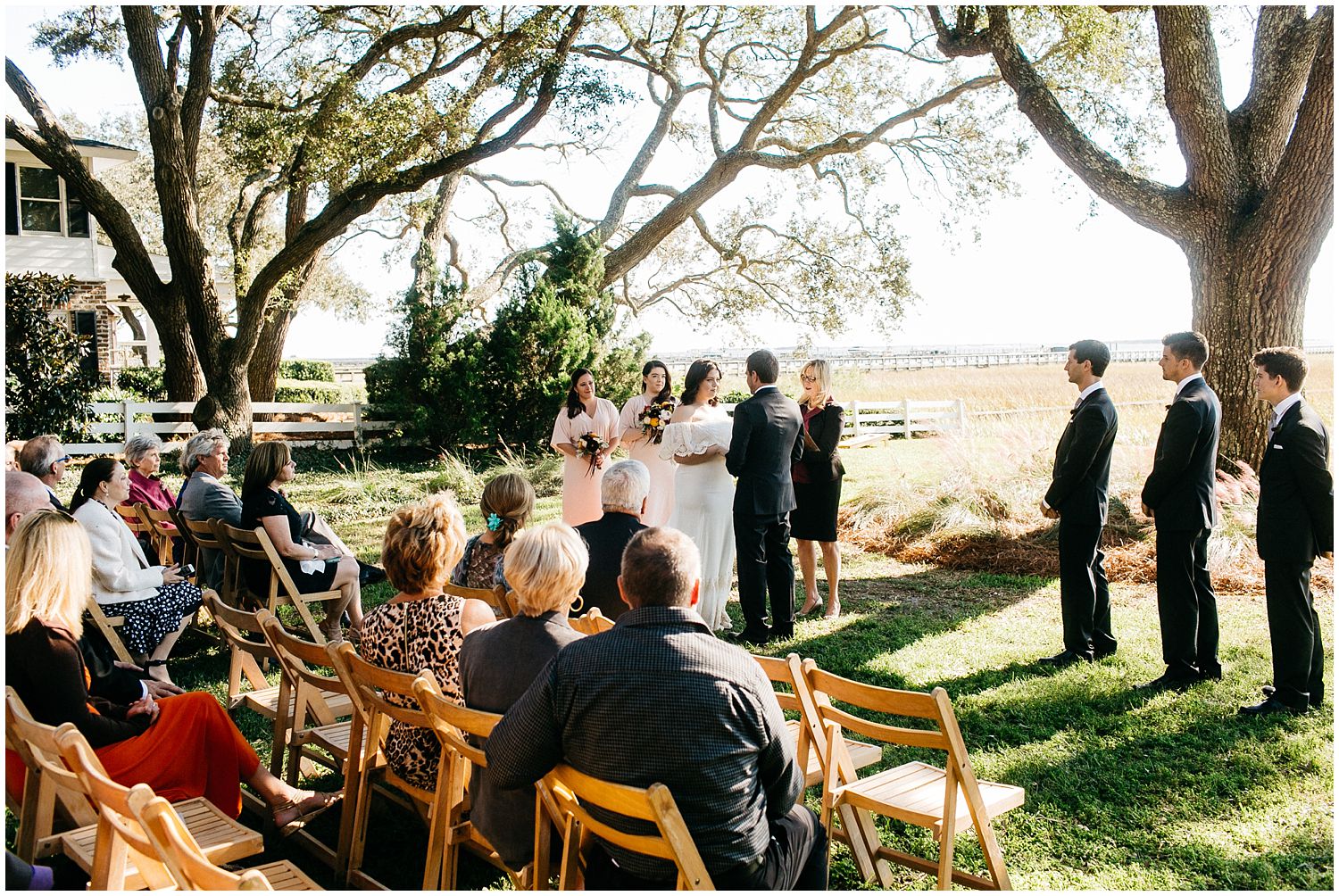 Wedding ceremony under oak trees