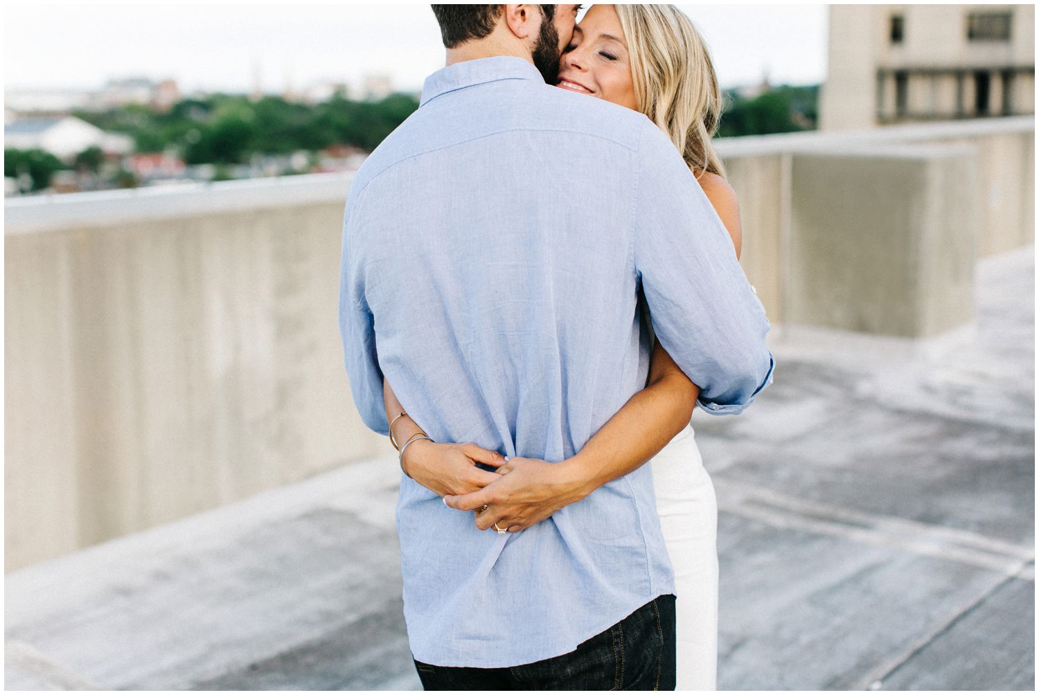 Couple hugging at engagement session