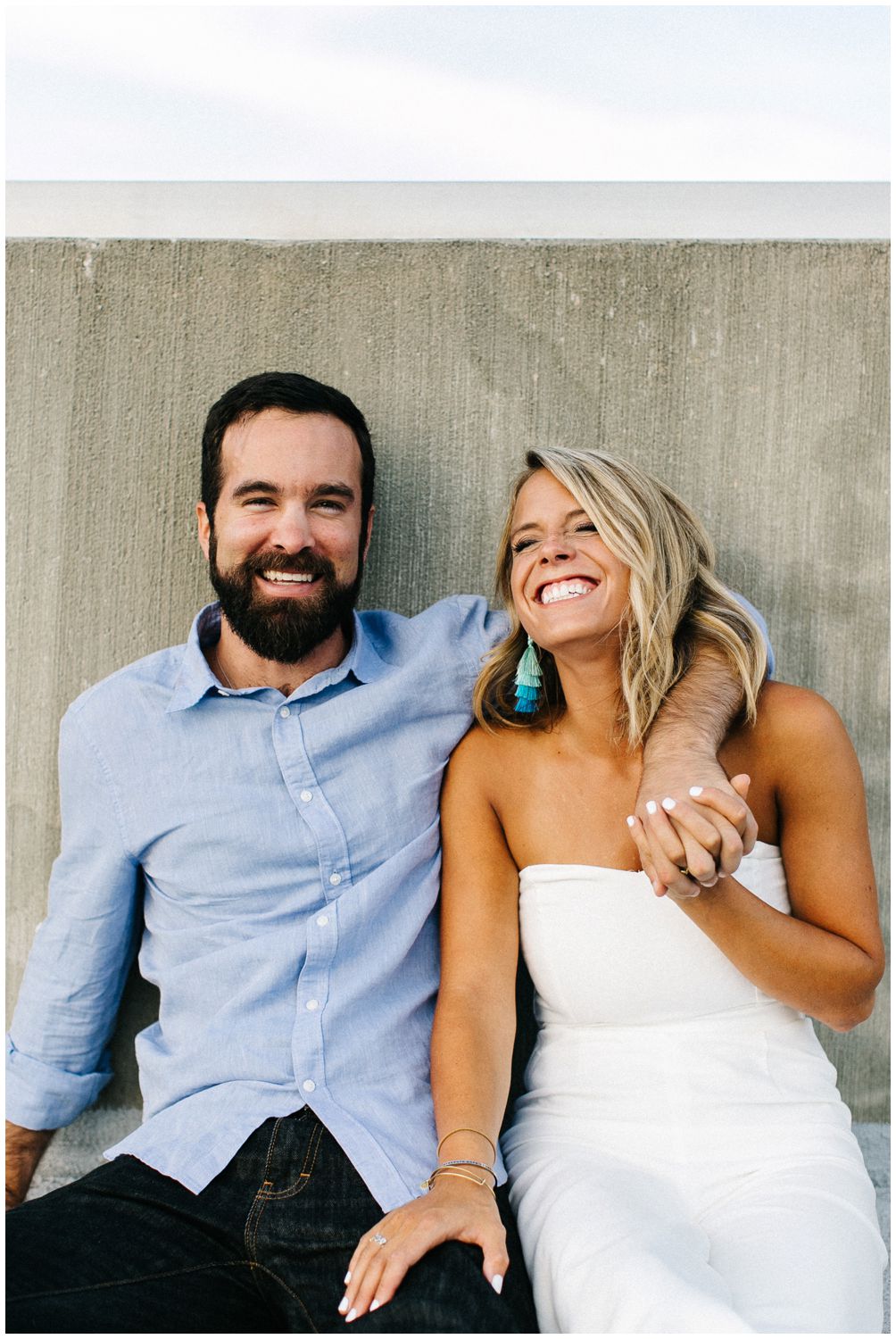 Couple laughing during engagement session