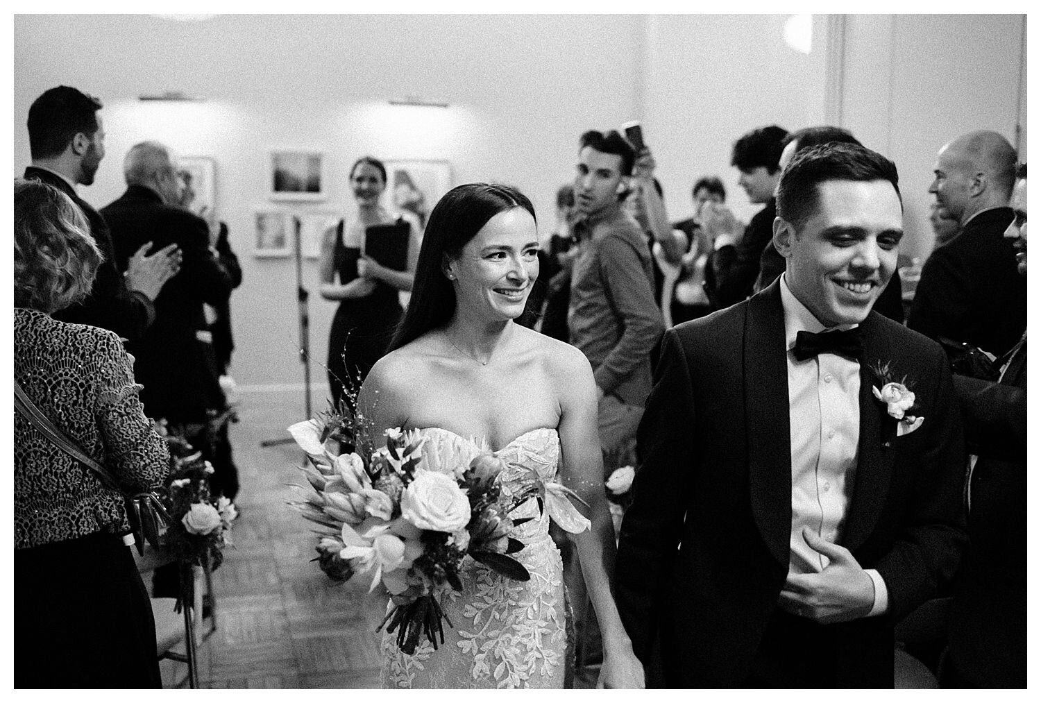 Bride and groom walking down aisle