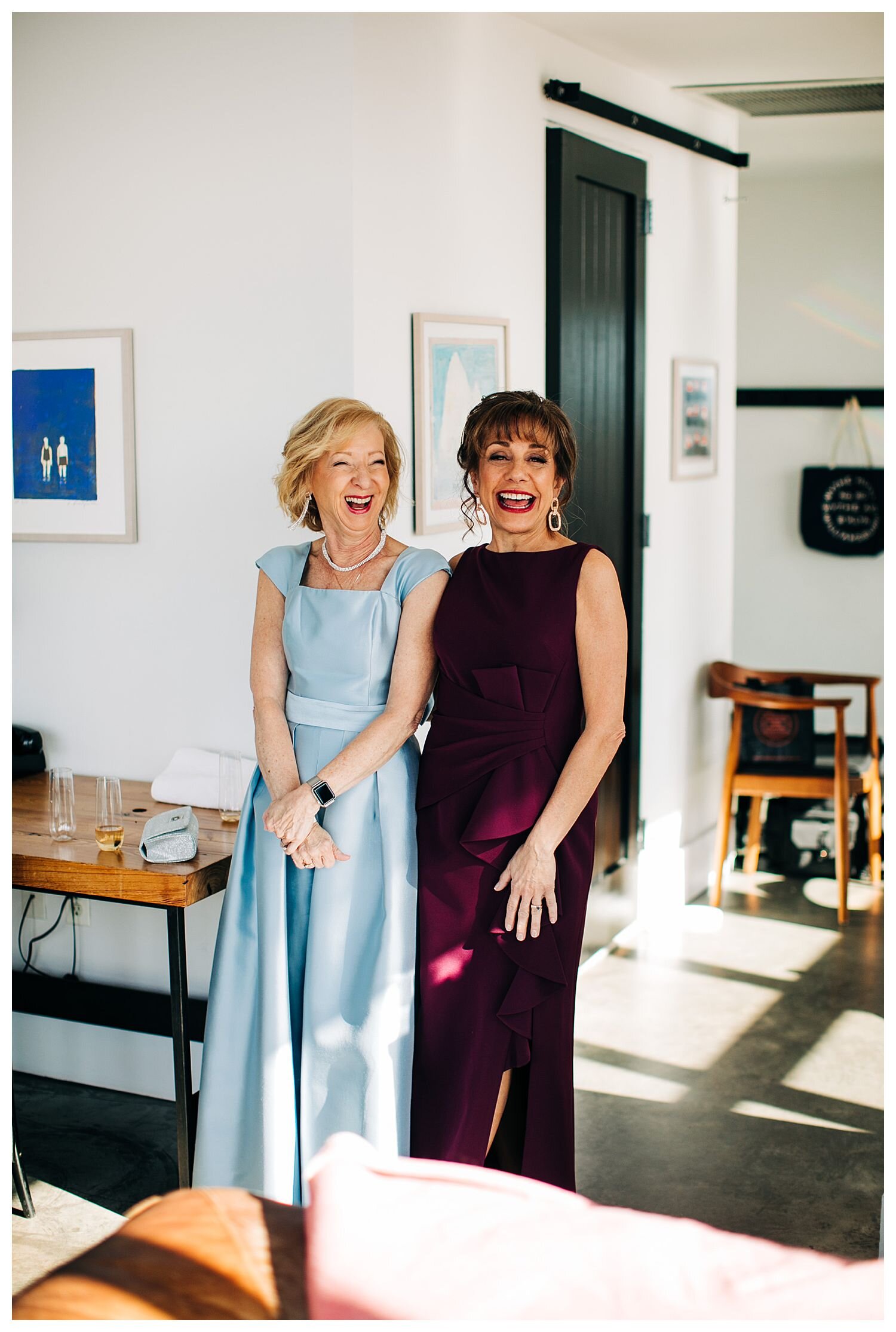 Mom helping bride get dressed