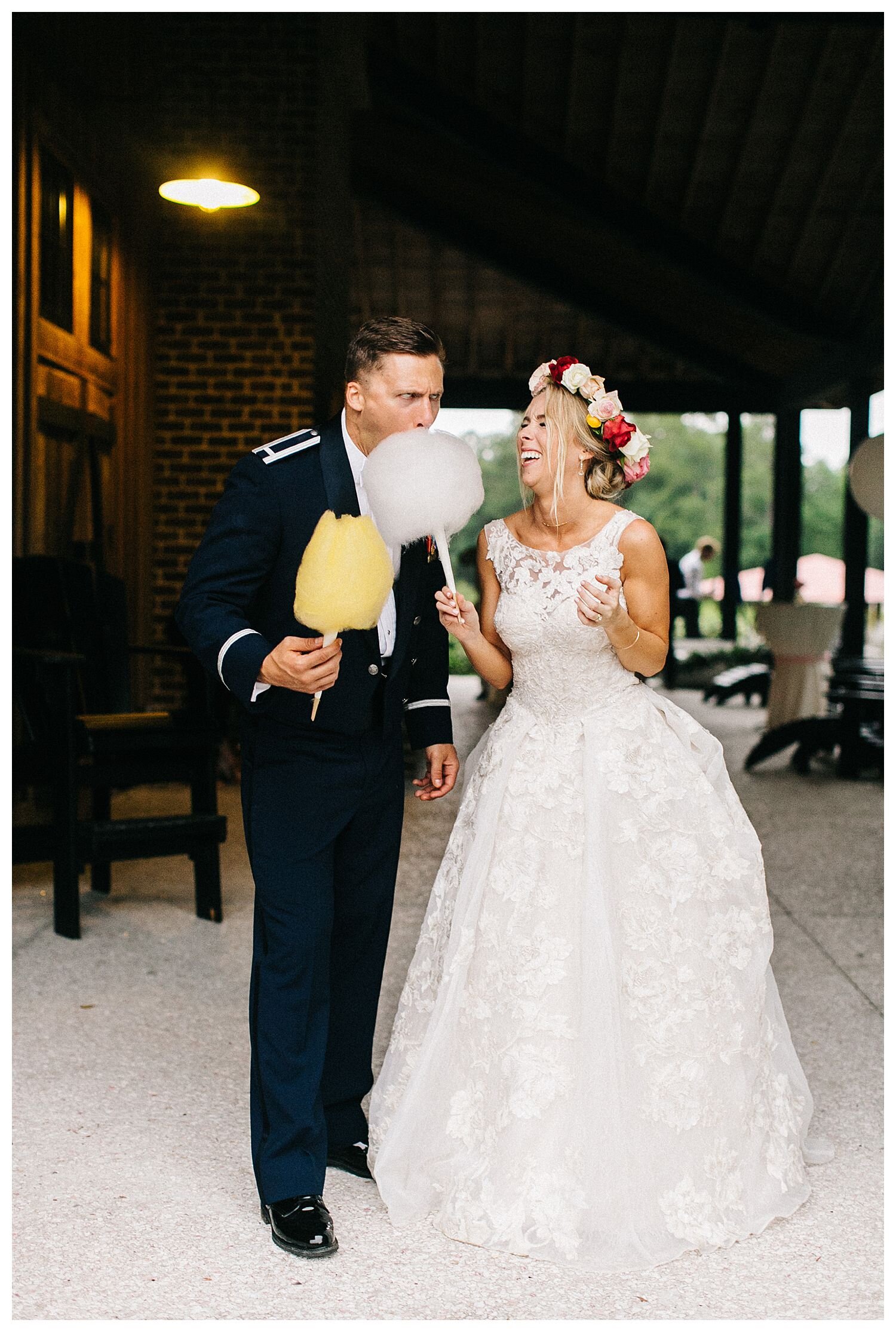 bride and groom eating cotton candy