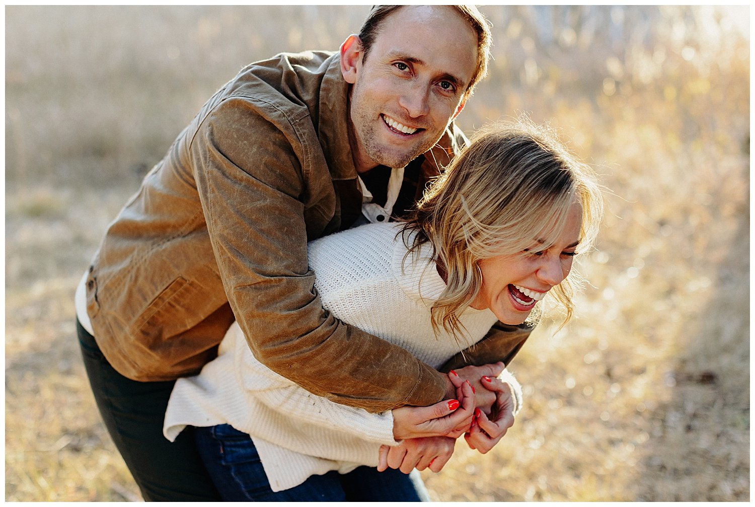 candid mountain engagement session in colorado