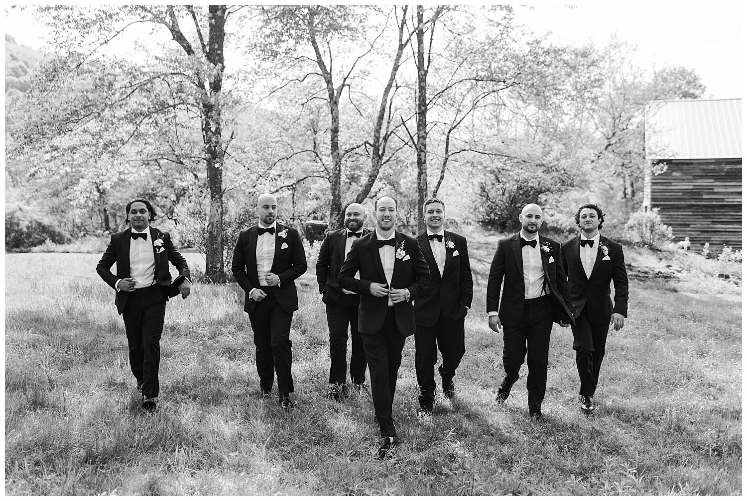 groom and groomsmen in black tie