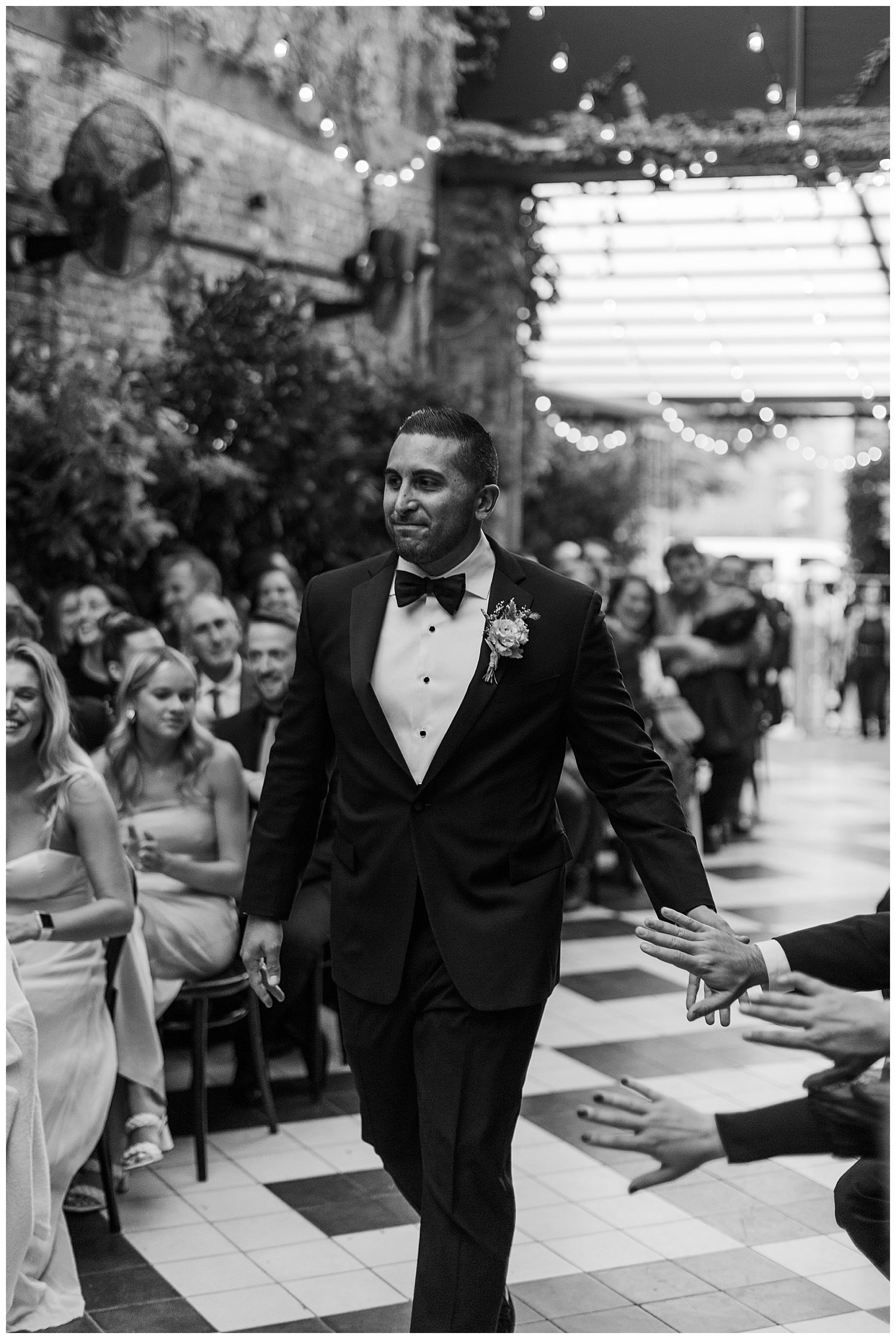 groom walking down the aisle nyc wedding