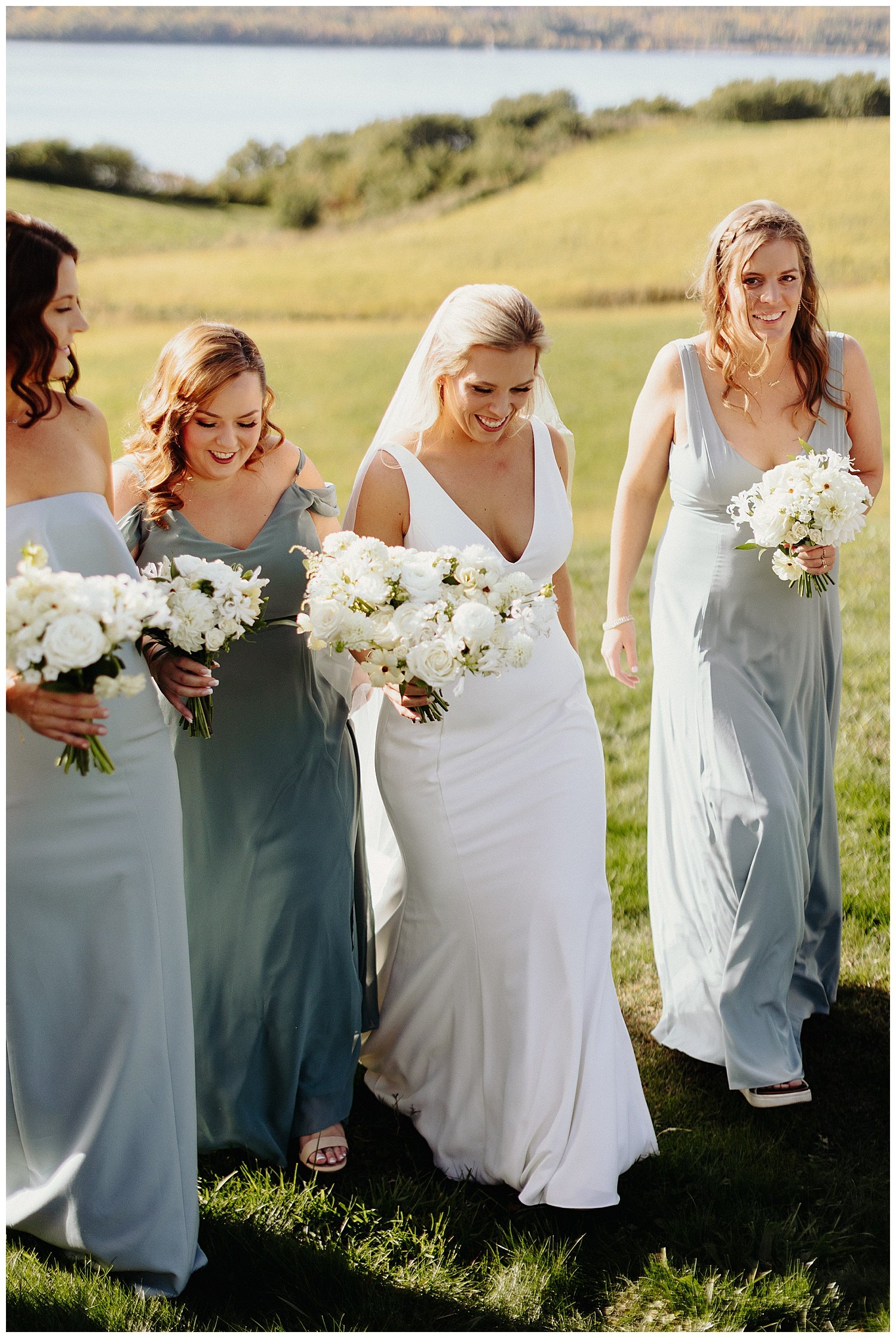 bridesmaids in long mismatched dresses