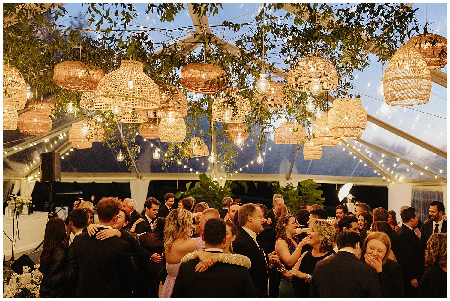 hanging baskets over dance floor wedding