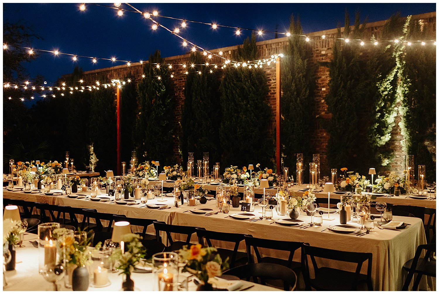 candlelit wedding reception in dewberry hotel courtyard