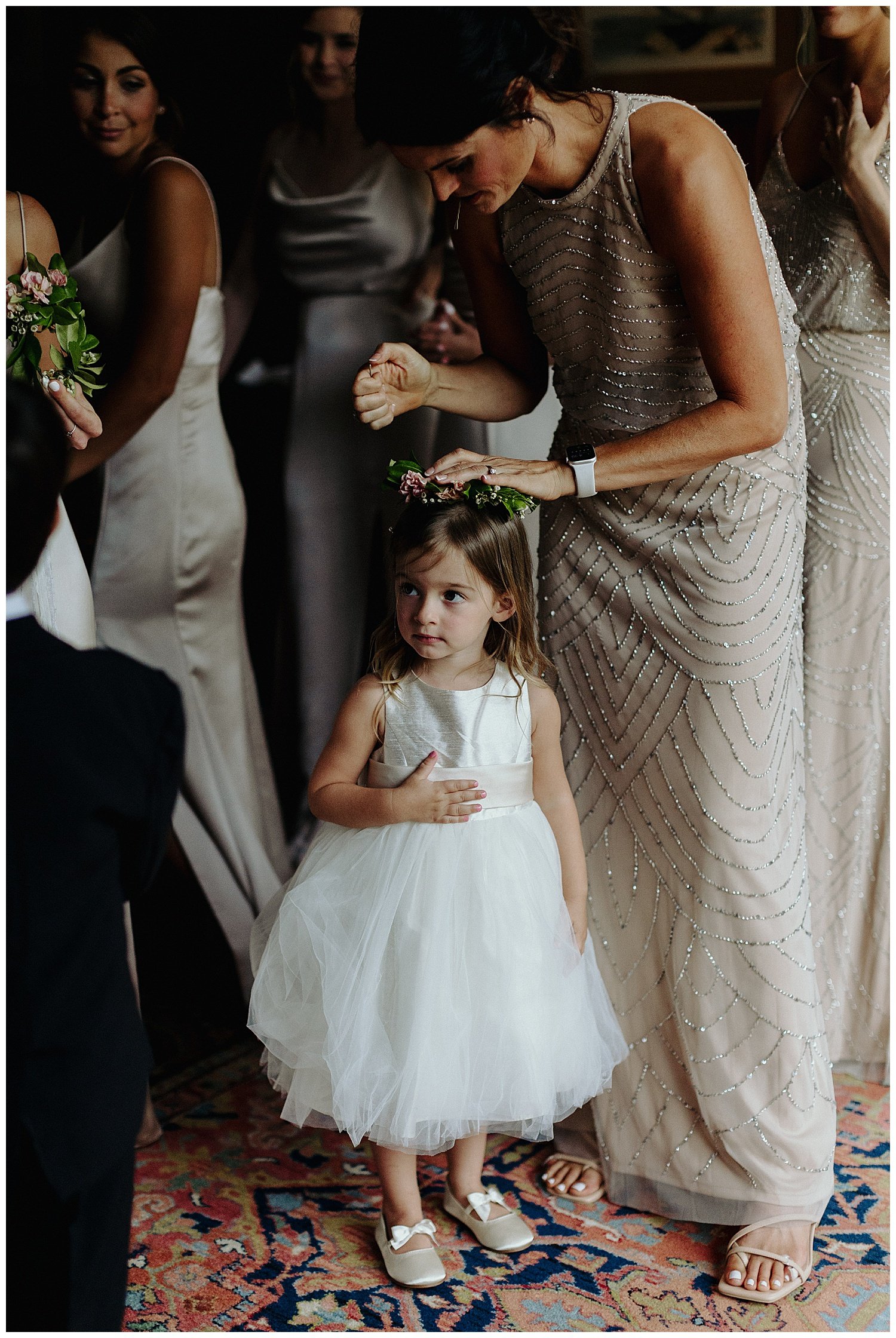 flower girl getting dressed