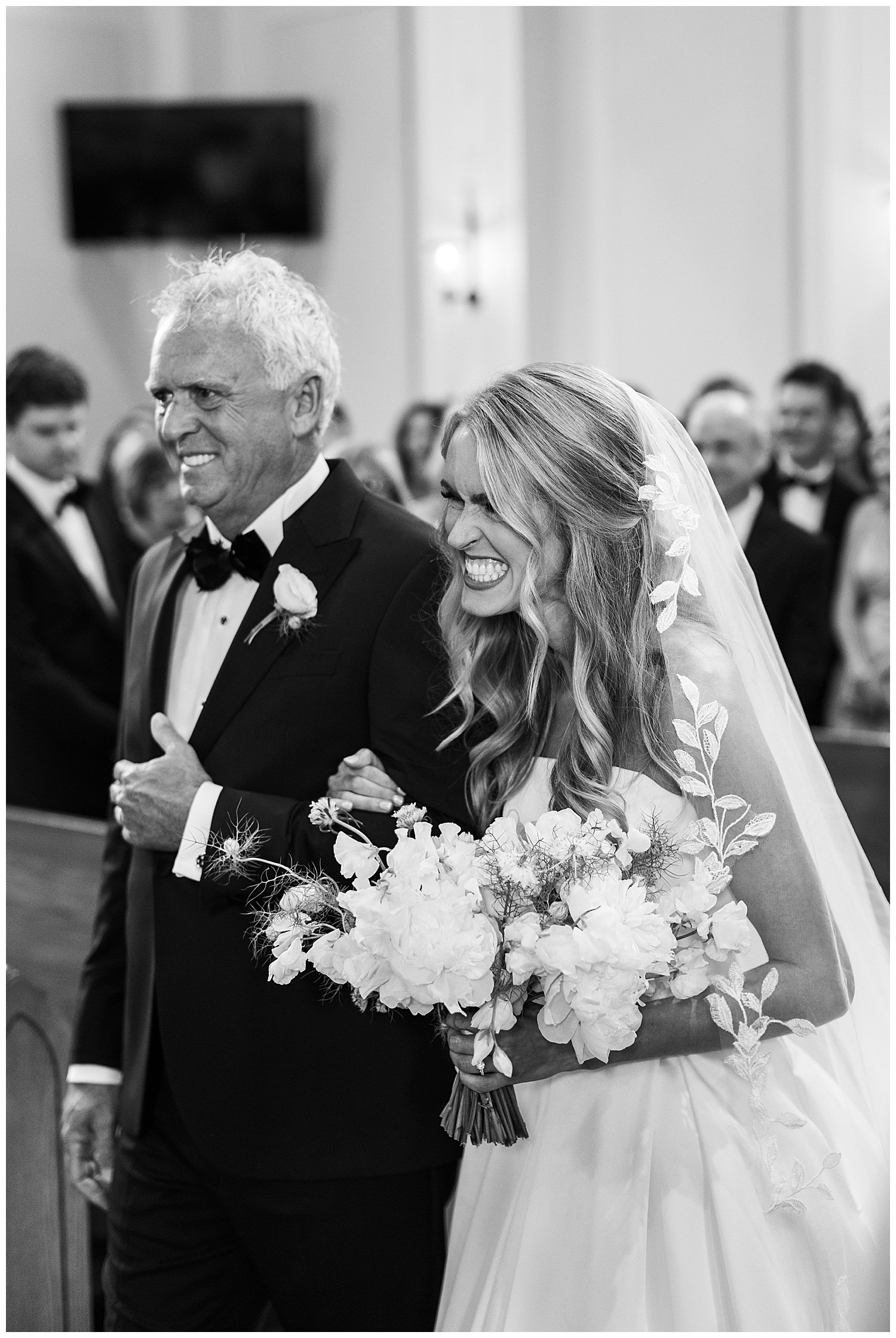 father of bride walking bride down aisle