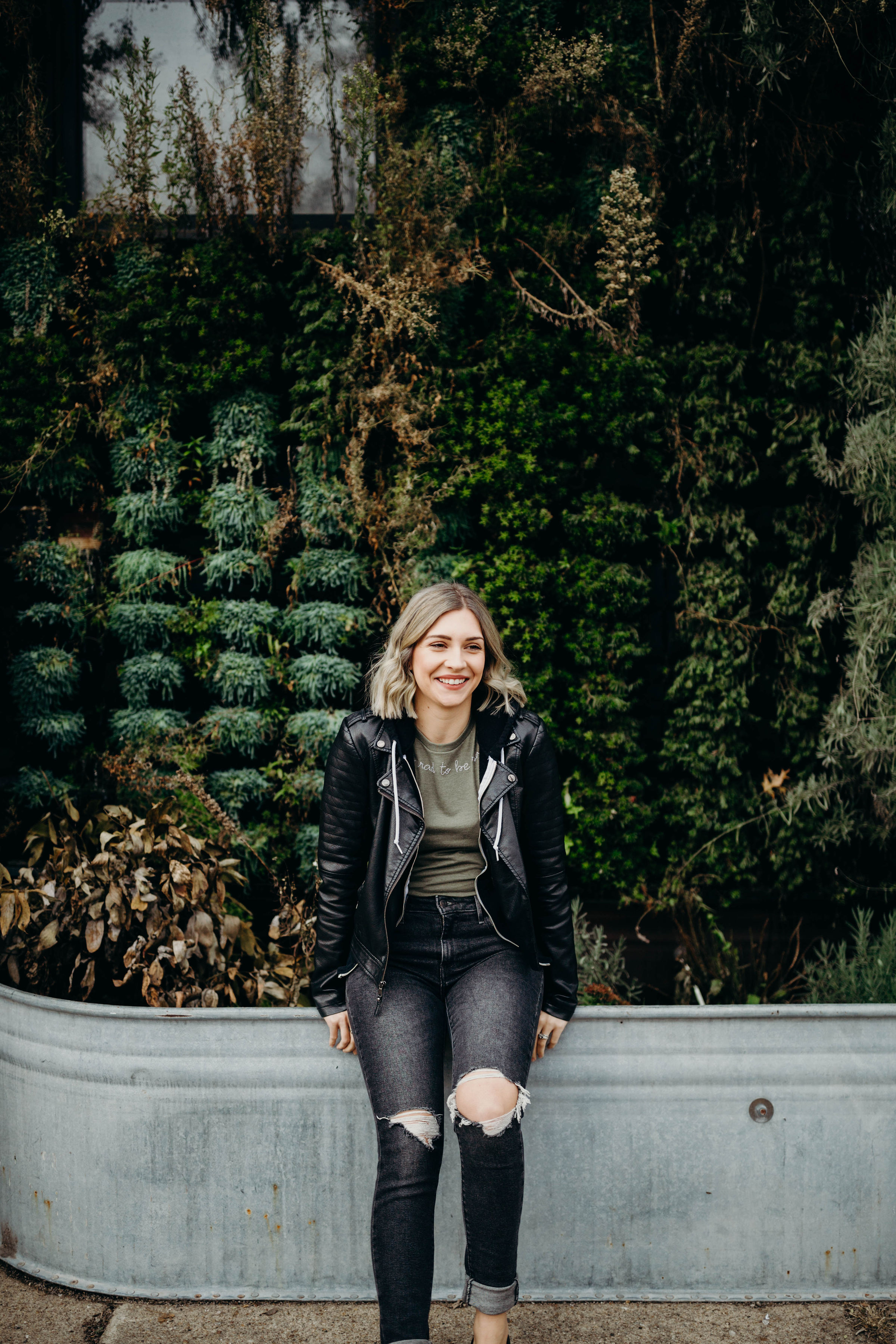 My go-to for instant cool! I try to avoid just wearing a zip-up hoodie because I find it can look somewhat sloppy. But toss on a leather jacket over it and hello chic! The t-shirt and the hood peeking out gives it an athleisure feel and the leather pulls the whole look together!