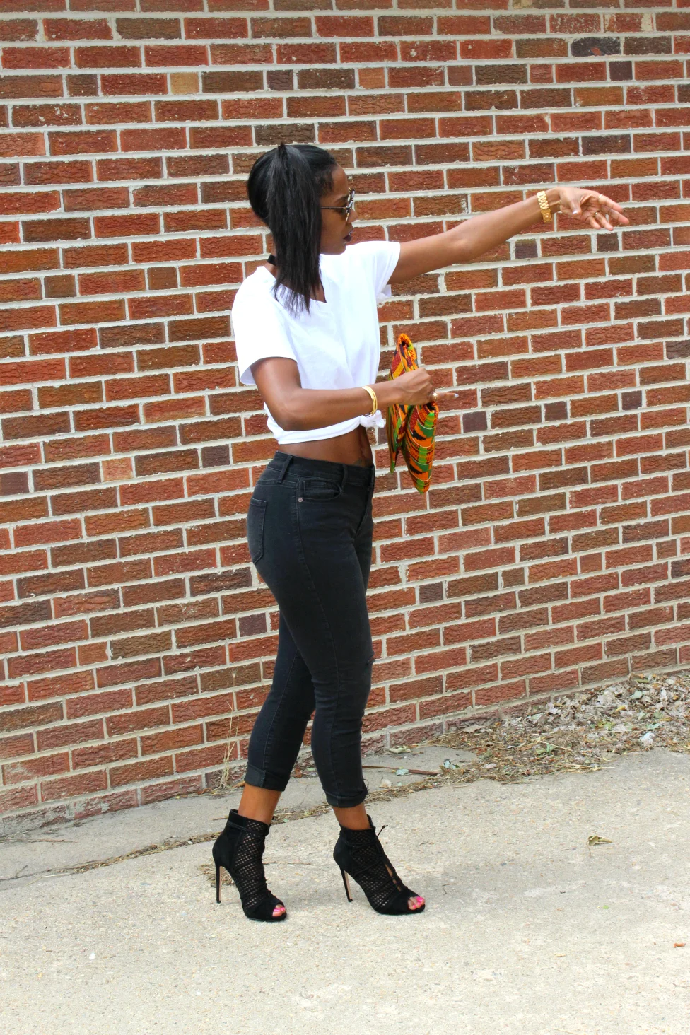 This is the pose you strike when you thought your hair was a bug crawling on you. Lol.
