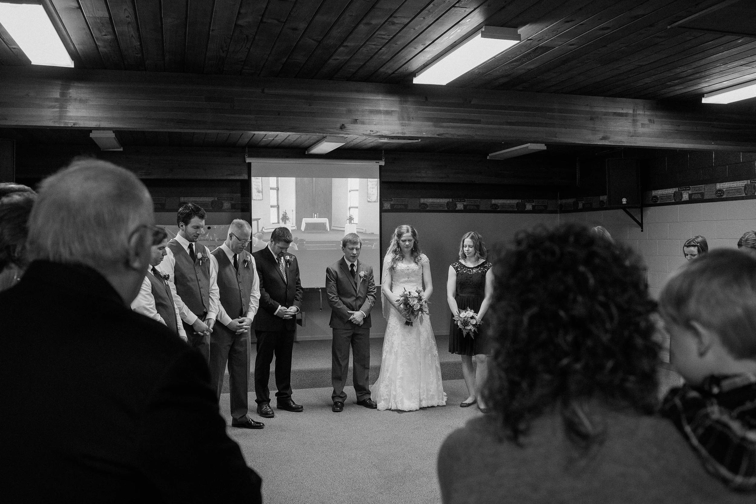 Close friends and family gathered for prayer before the ceremony.