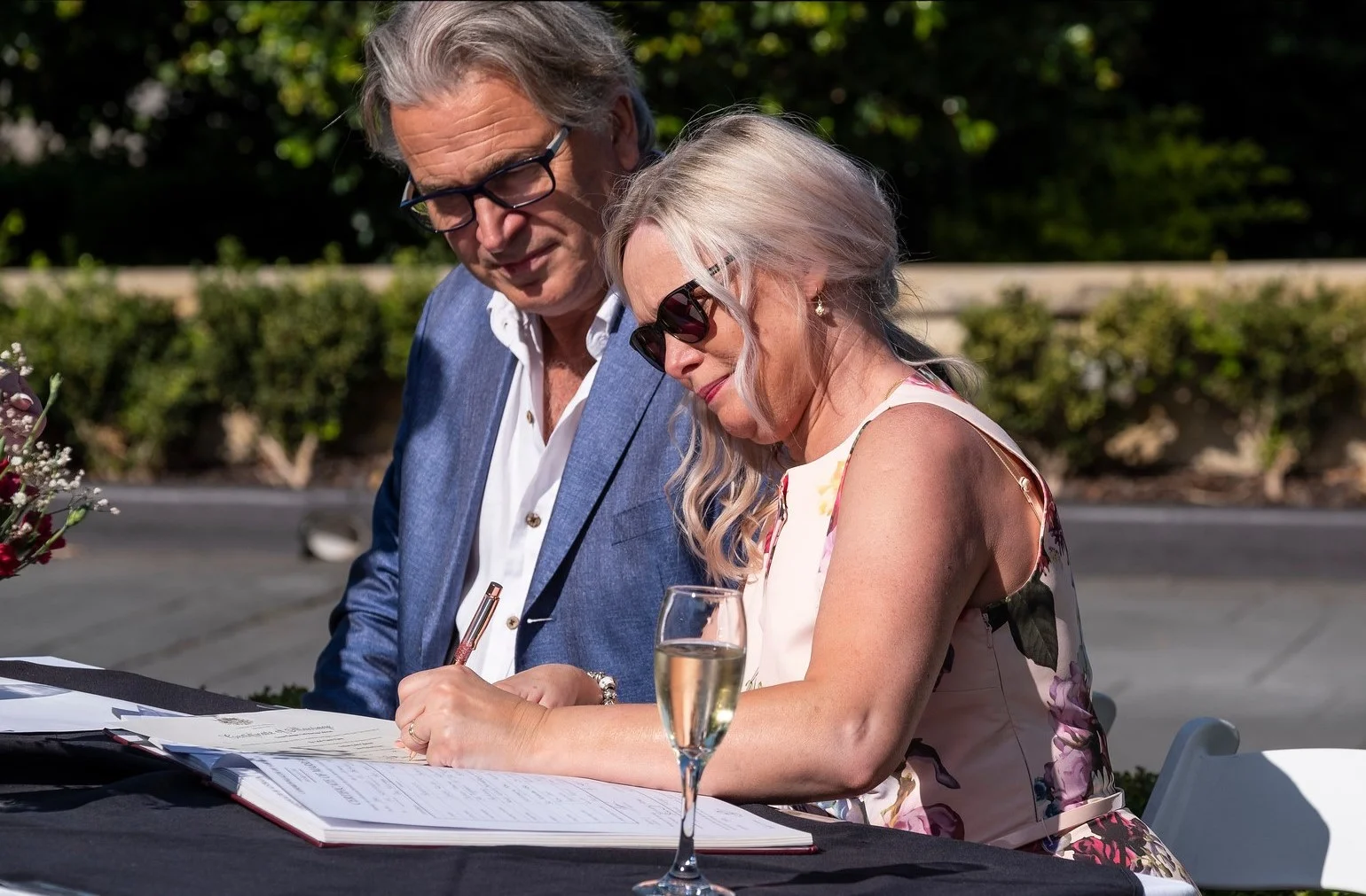 Andy and Joanne witness the wedding signatures