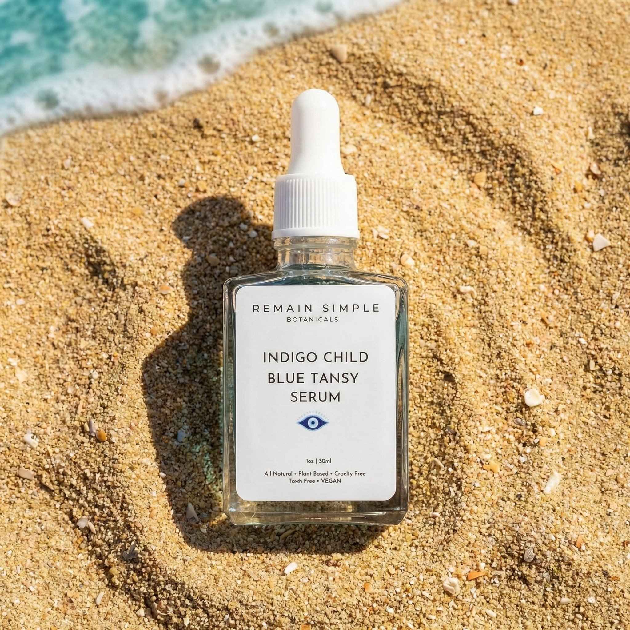 The only "Indigo Child" you need in your beach bag. 🌊 Our Blue Tansy Serum is the ultimate reset button for sun-drenched or reactive skin. Lightweight, cooling, and completely plant-based. Because your vacation glow shouldn't come with a c