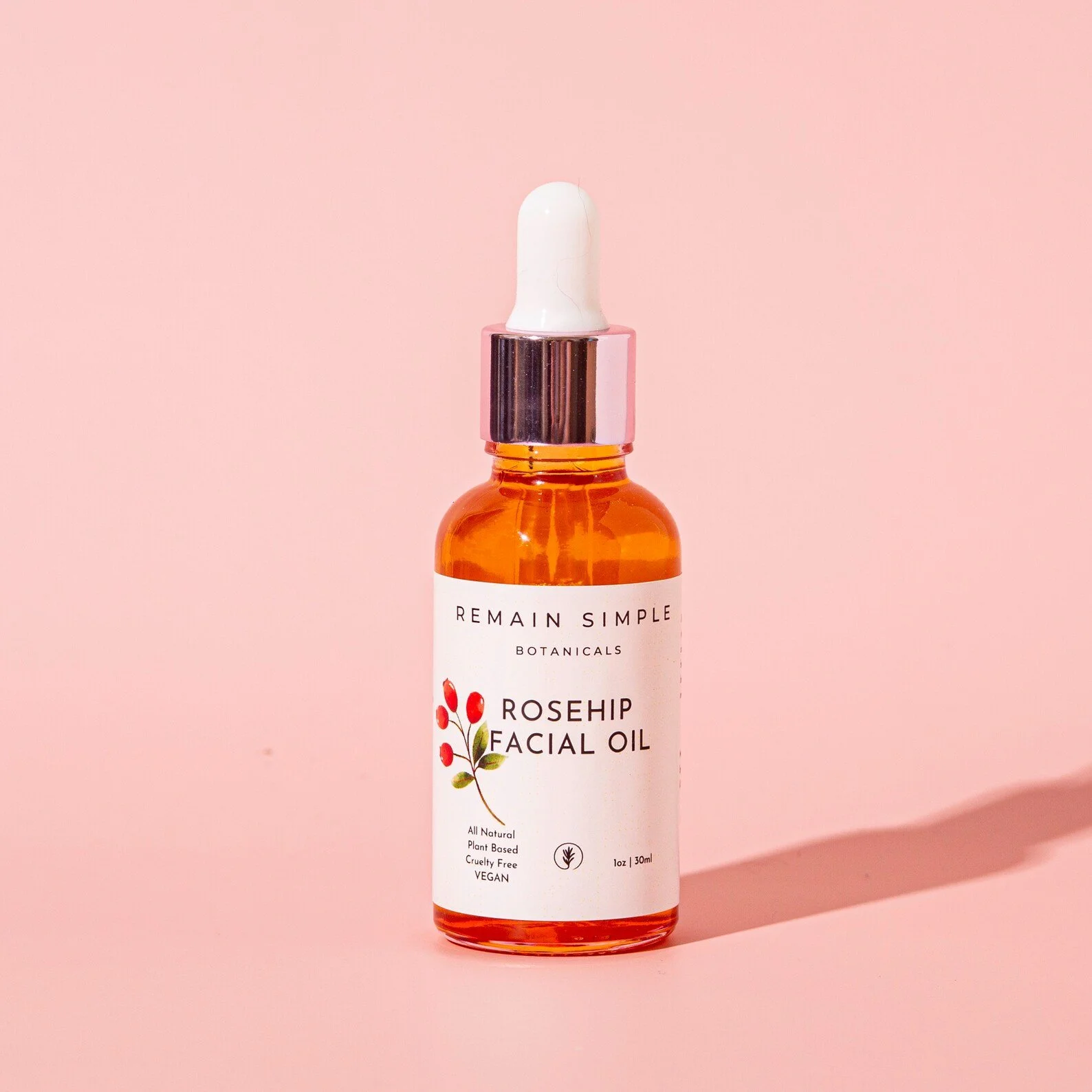 Concentrated natural facial oil in a glass dropper bottle designed to restore skin radiance and smooth texture.