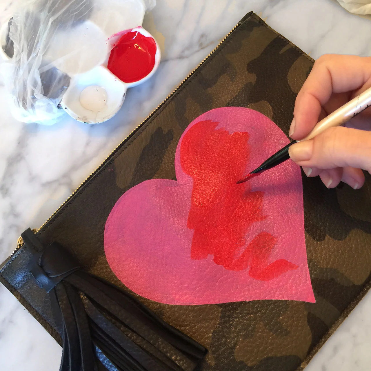 7x10_TasselCamouPouch_heart_fab.jpg