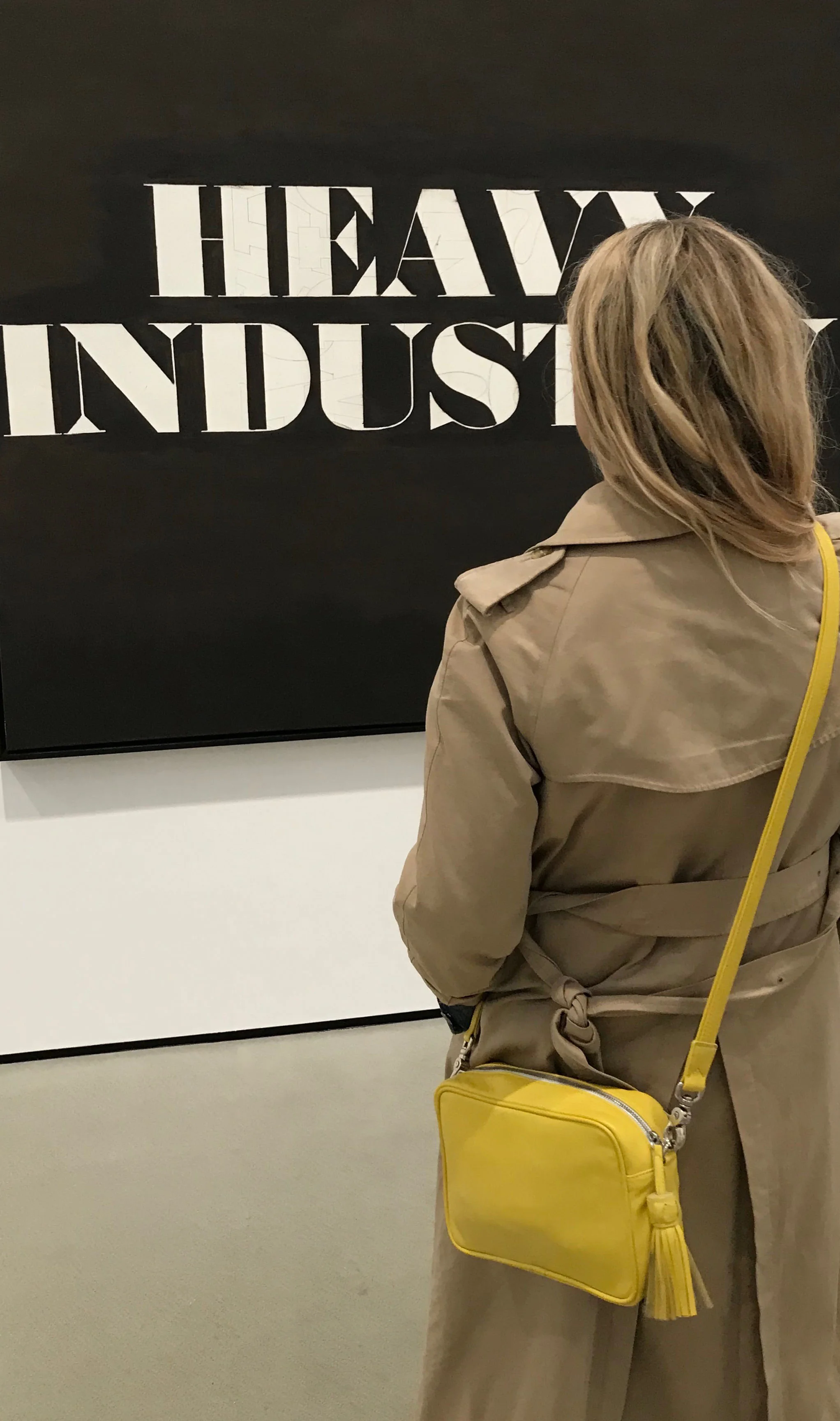 Yellow olivia on fab w burburry coat.jpg