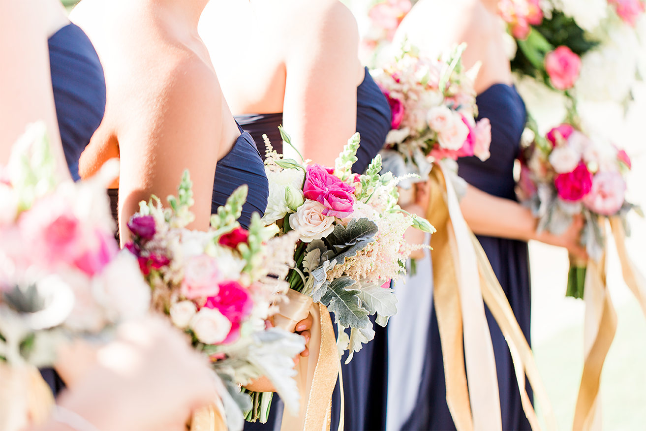 bridesmaids with their flower bouquets from happily ever after floral