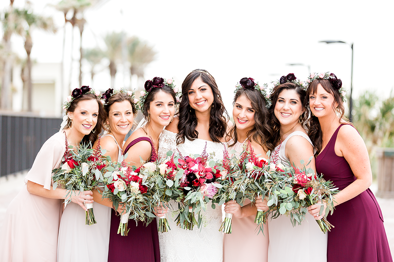 bridal party with their flower bouquets